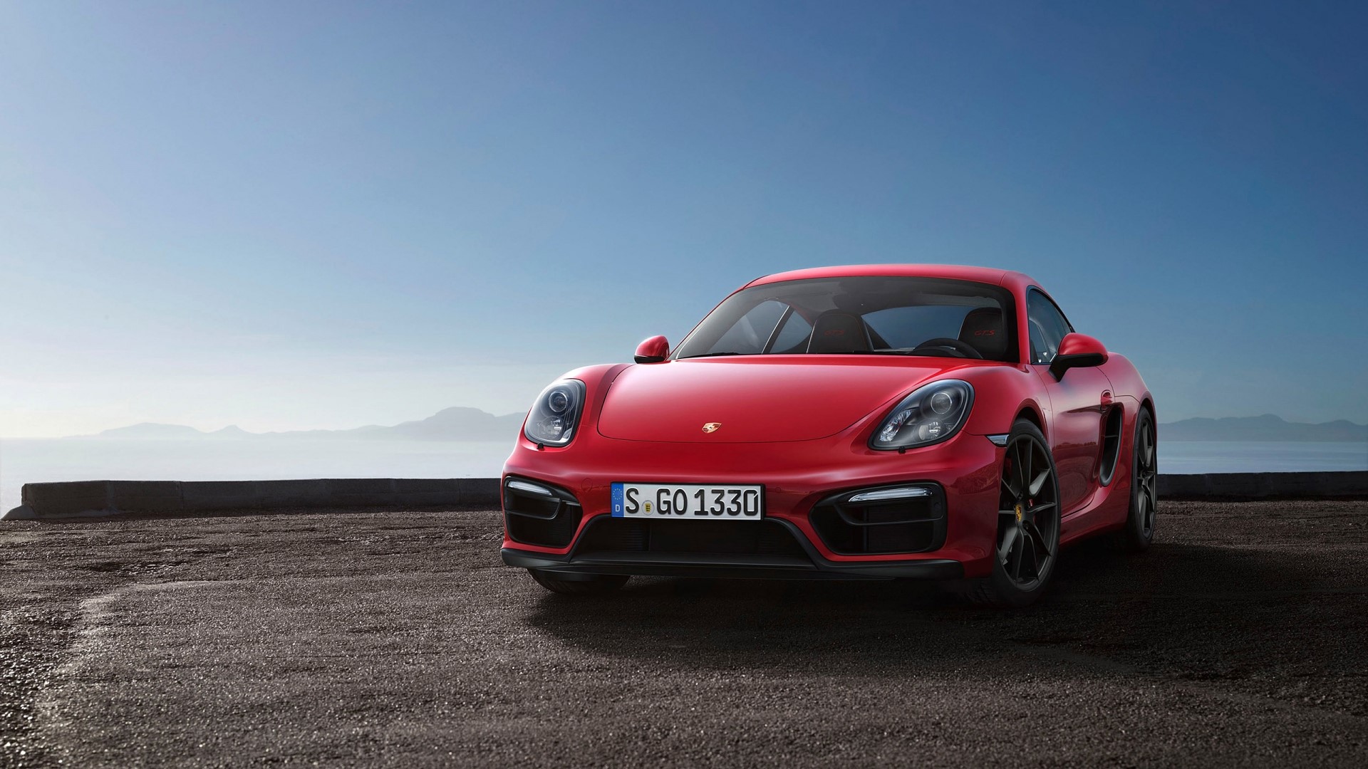Red Porsche Cayman GTS 2015 on a road HD Wallpaper