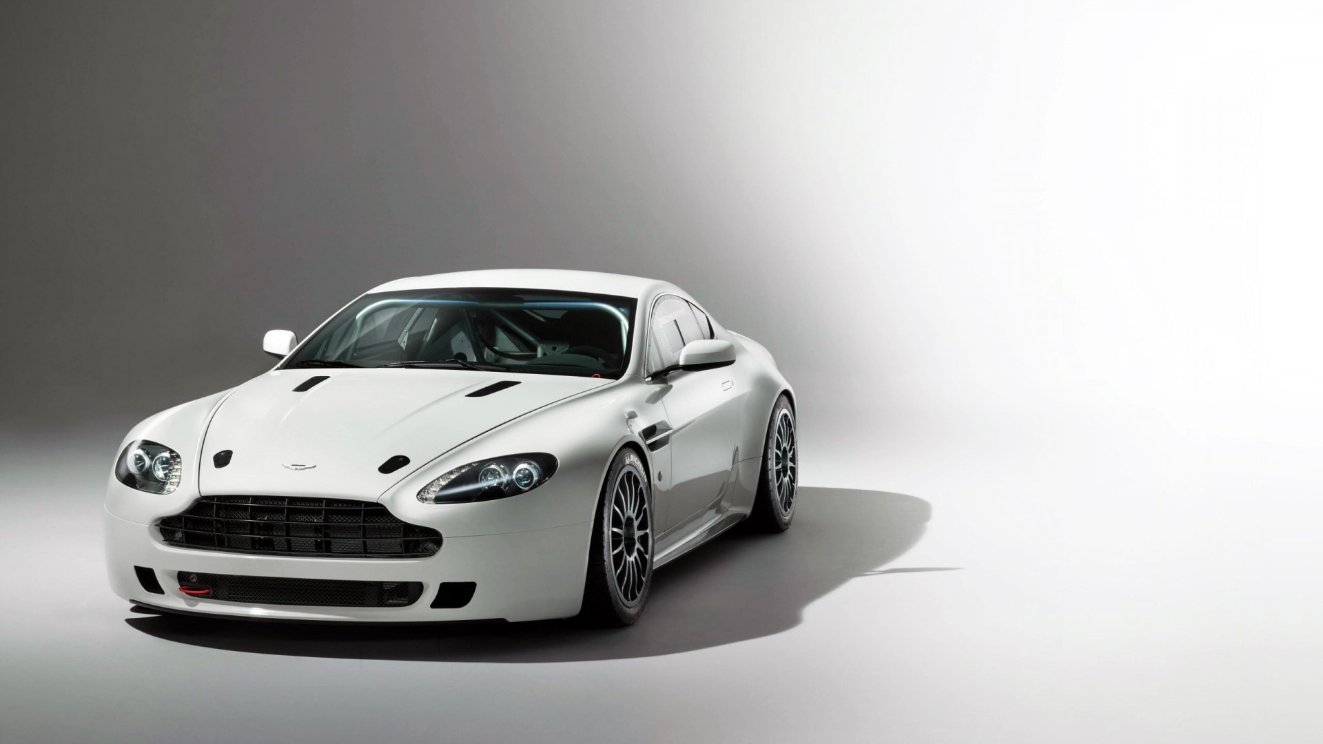 White Aston Martin Vantage GT4 race car HD Wallpaper