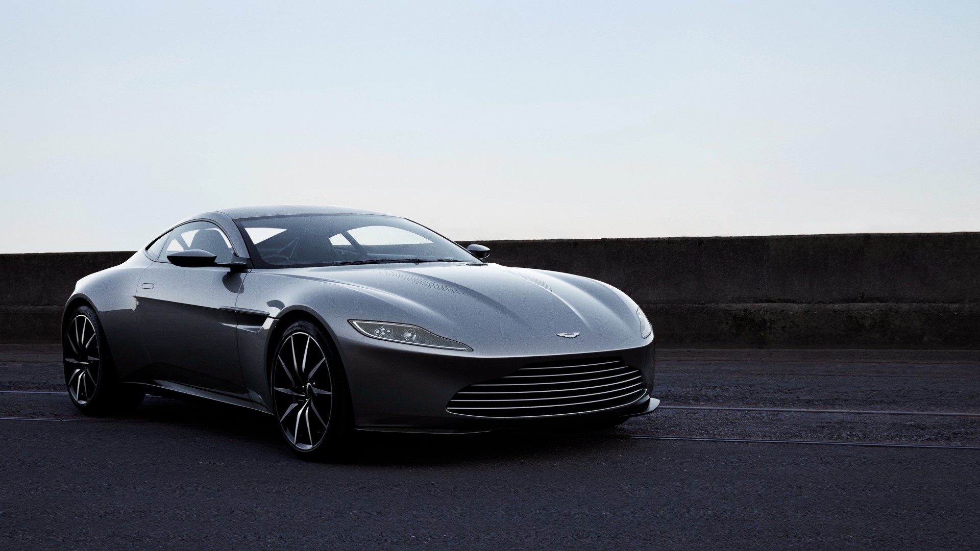 Aston Martin Vantage parked on a road HD Wallpaper