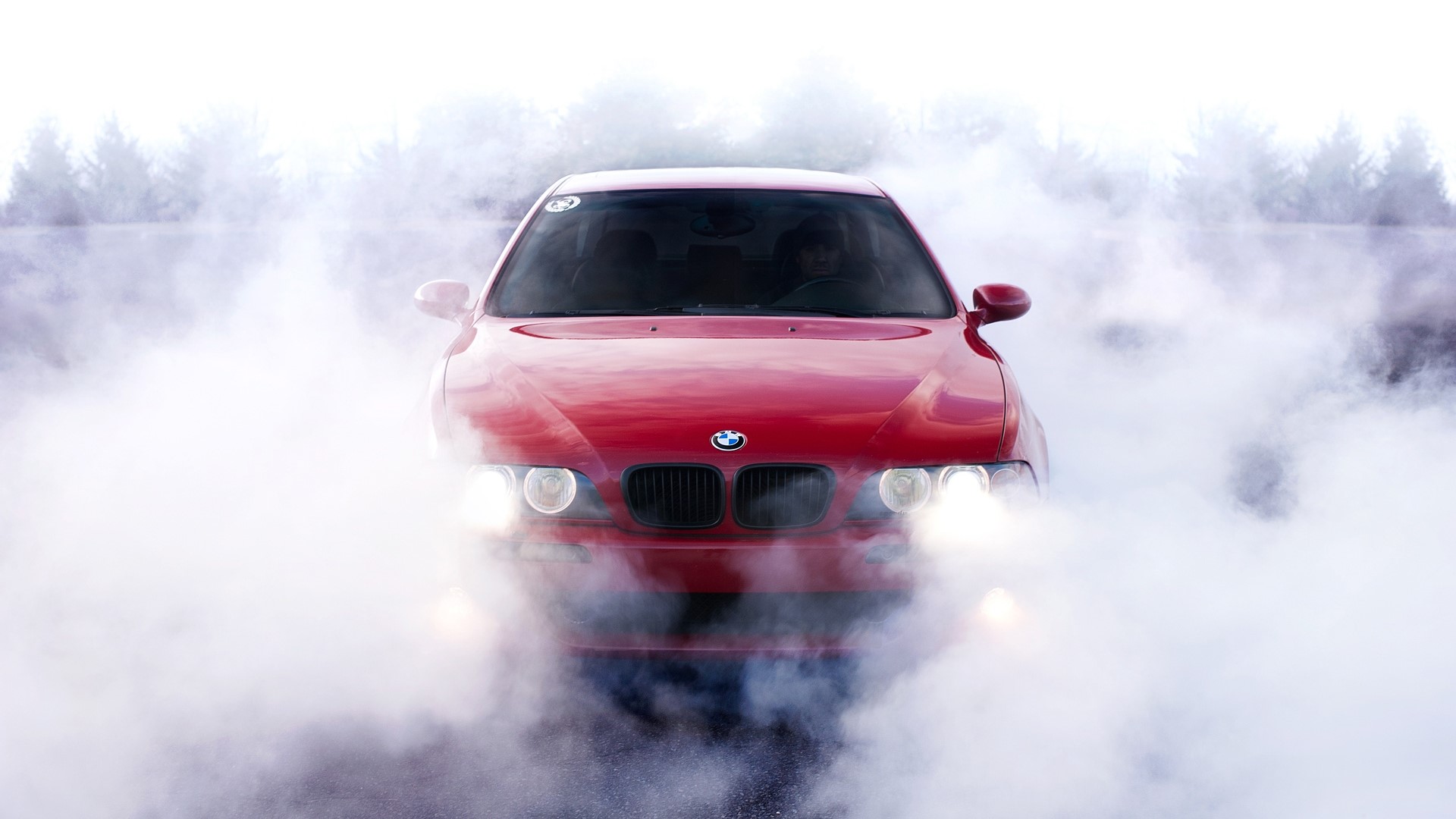 Red BMW 5 Series drifting in smoke HD Wallpaper