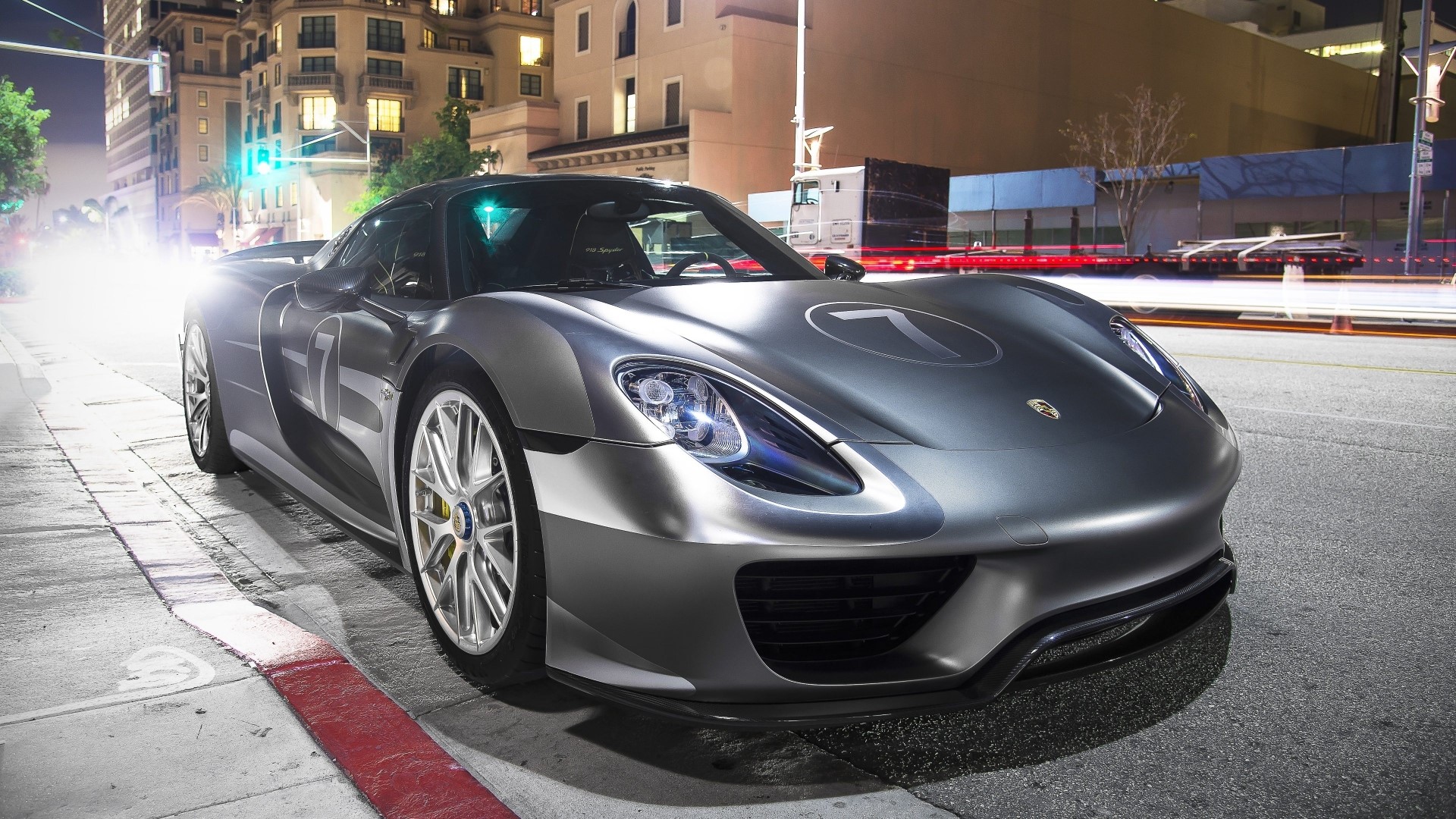 Porsche 918 Spyder electric car on city street HD Wallpaper