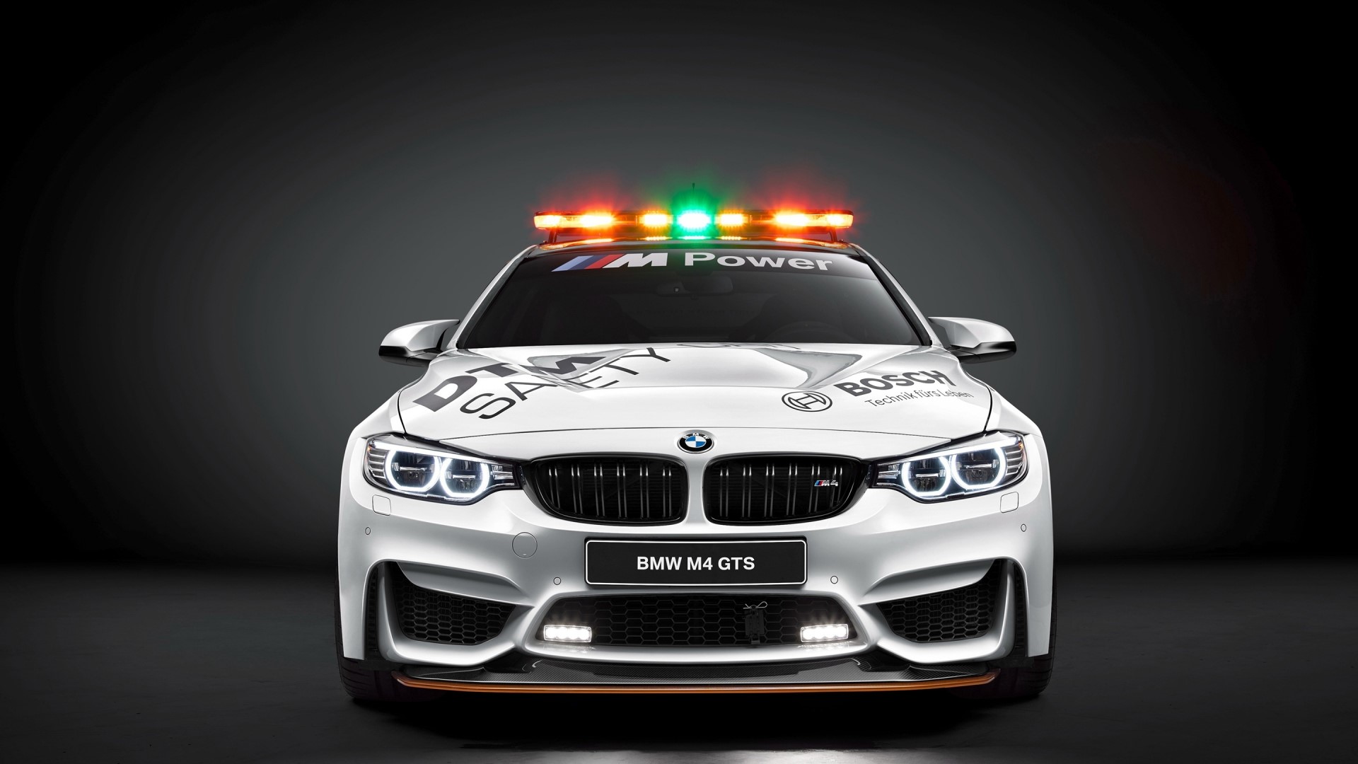 BMW M4 GTS Safety Car with Lights HD Wallpaper