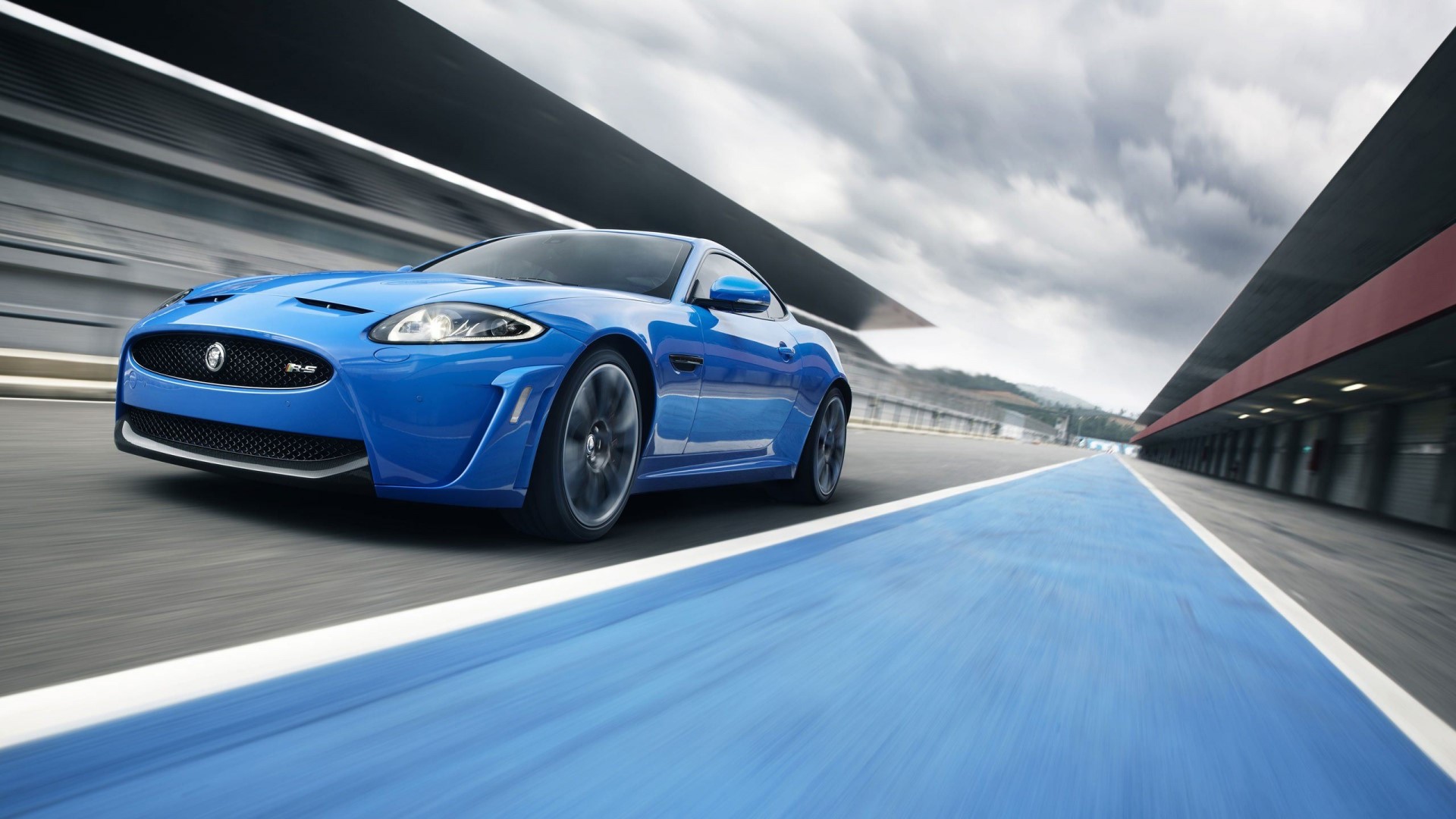 Blue Jaguar XKRS on a Racetrack HD Wallpaper