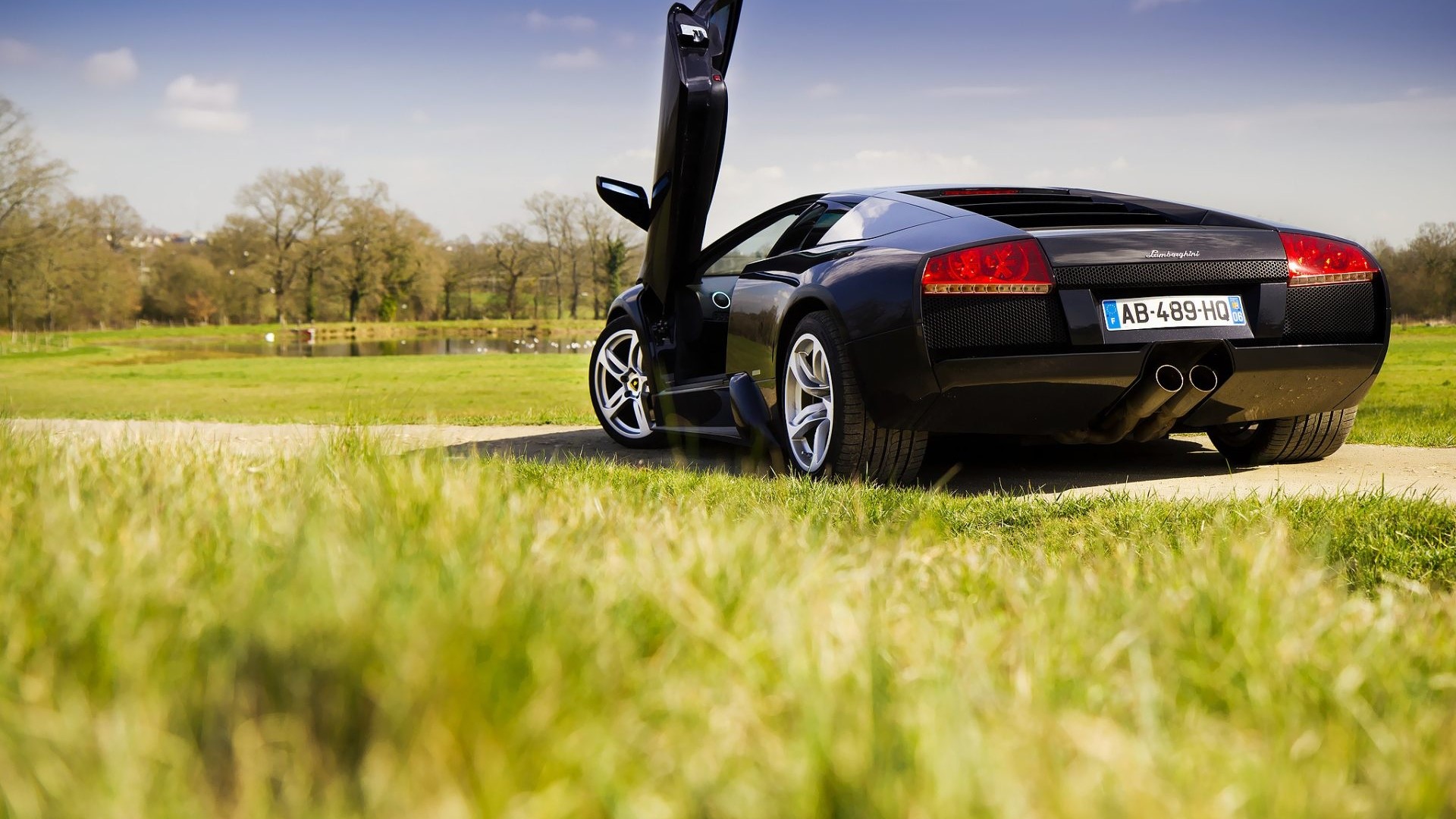 Black Lamborghini Murcielago with doors open HD Wallpaper