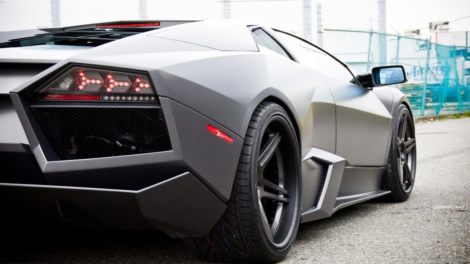 Matte black Lamborghini Reventon rear view HD Wallpaper
