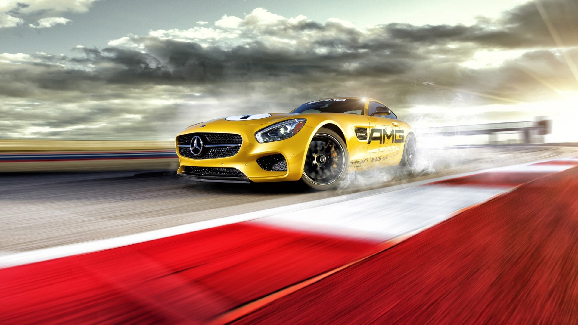 Yellow 2016 Mercedes-AMG GT S on a race track HD Wallpaper