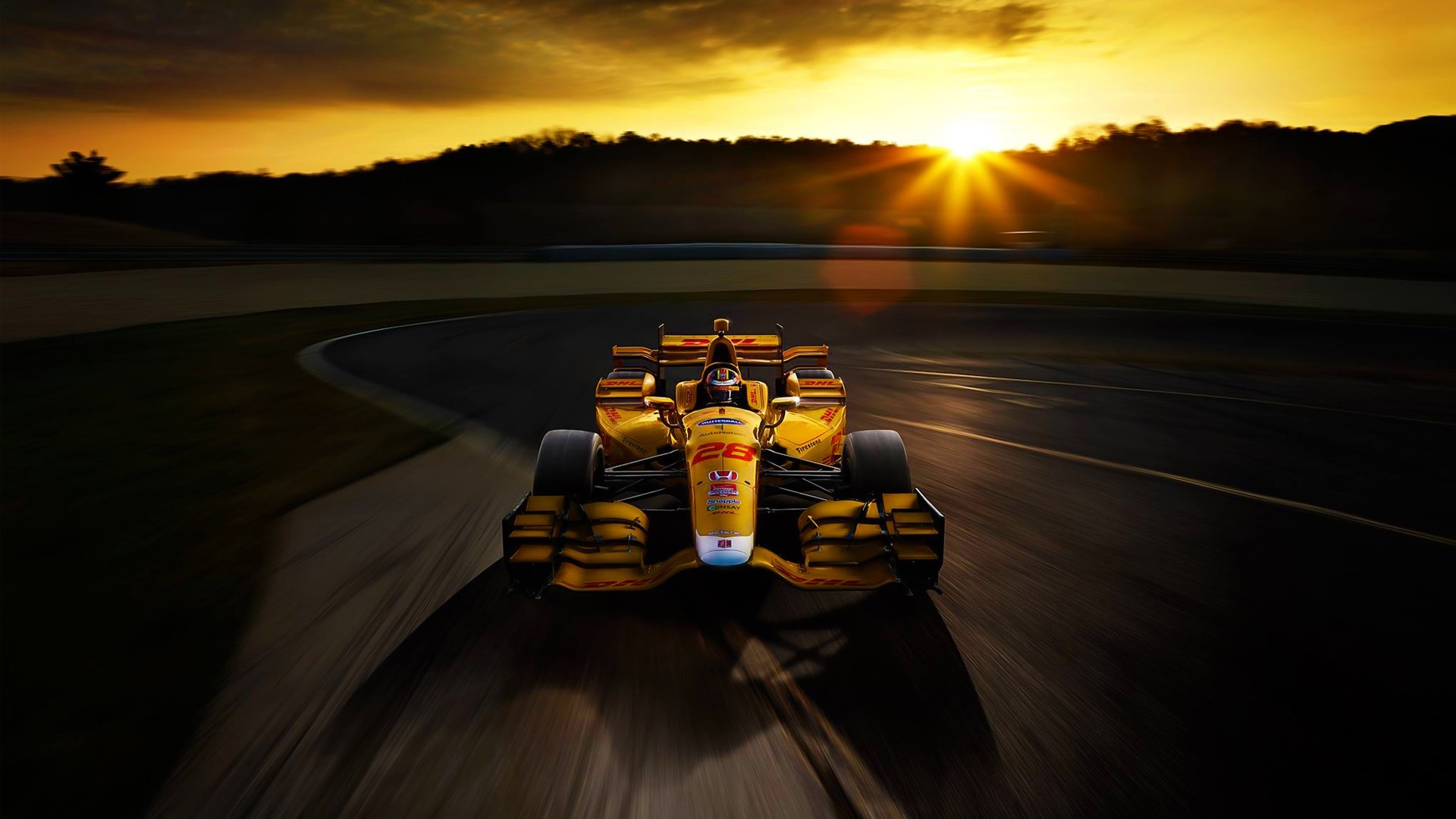 Yellow Honda F1 Race Car on Track at Sunset HD Wallpaper