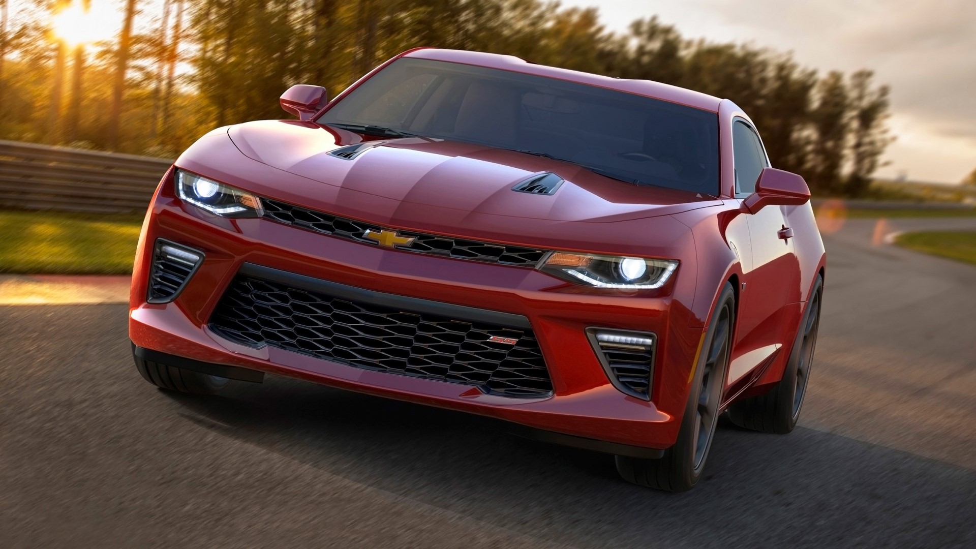 2016 Chevrolet Camaro SS driving on a road HD Wallpaper