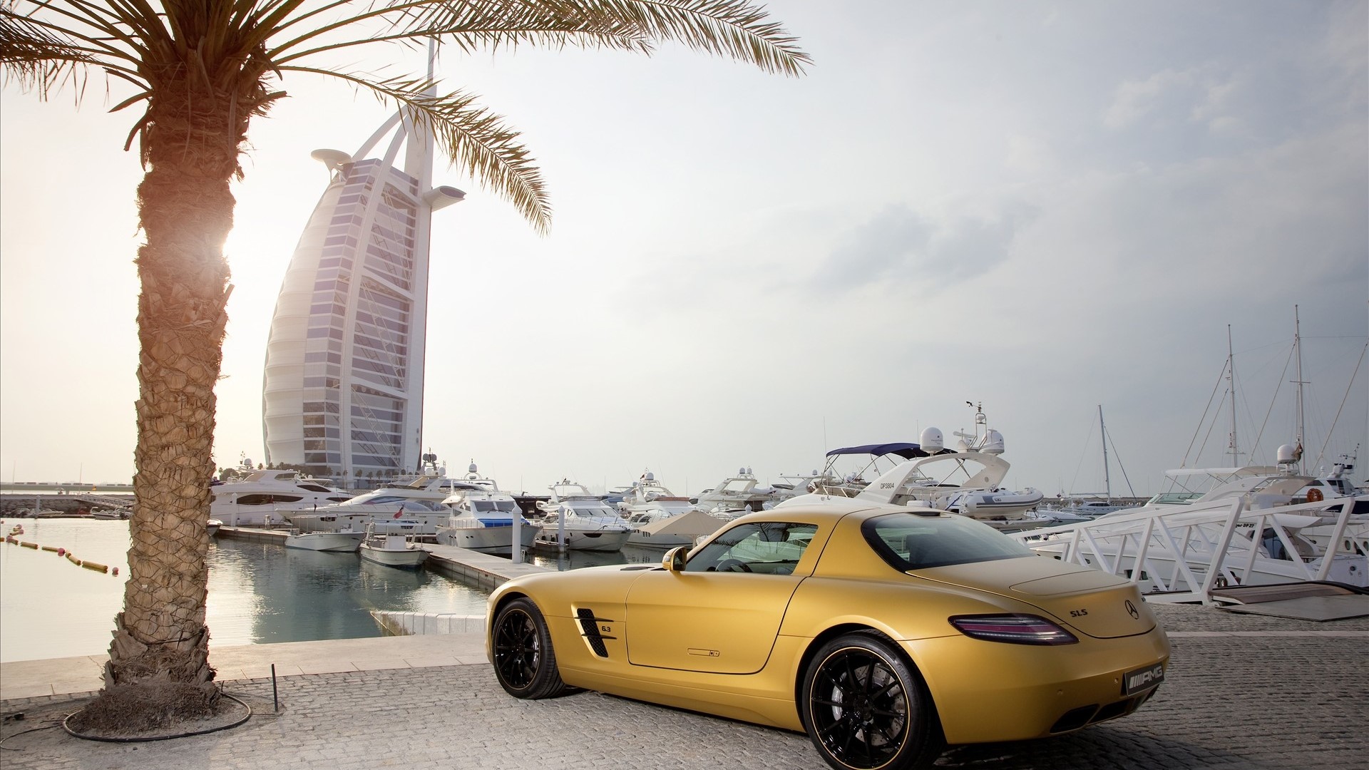 Gold Mercedes Benz SLS AMG by Burj Al Arab HD Wallpaper
