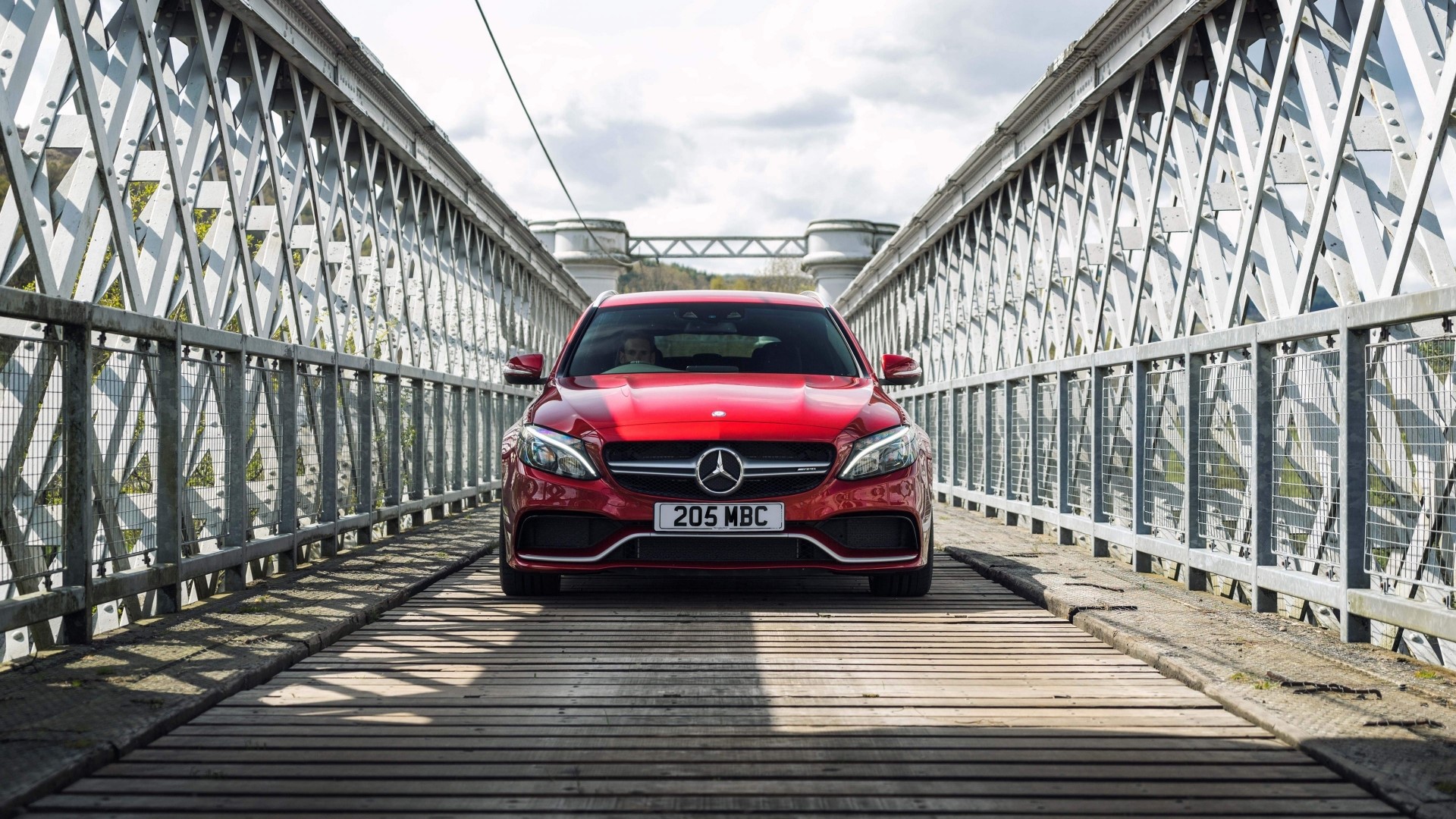 Red Mercedes C63 AMG on a bridge HD Wallpaper