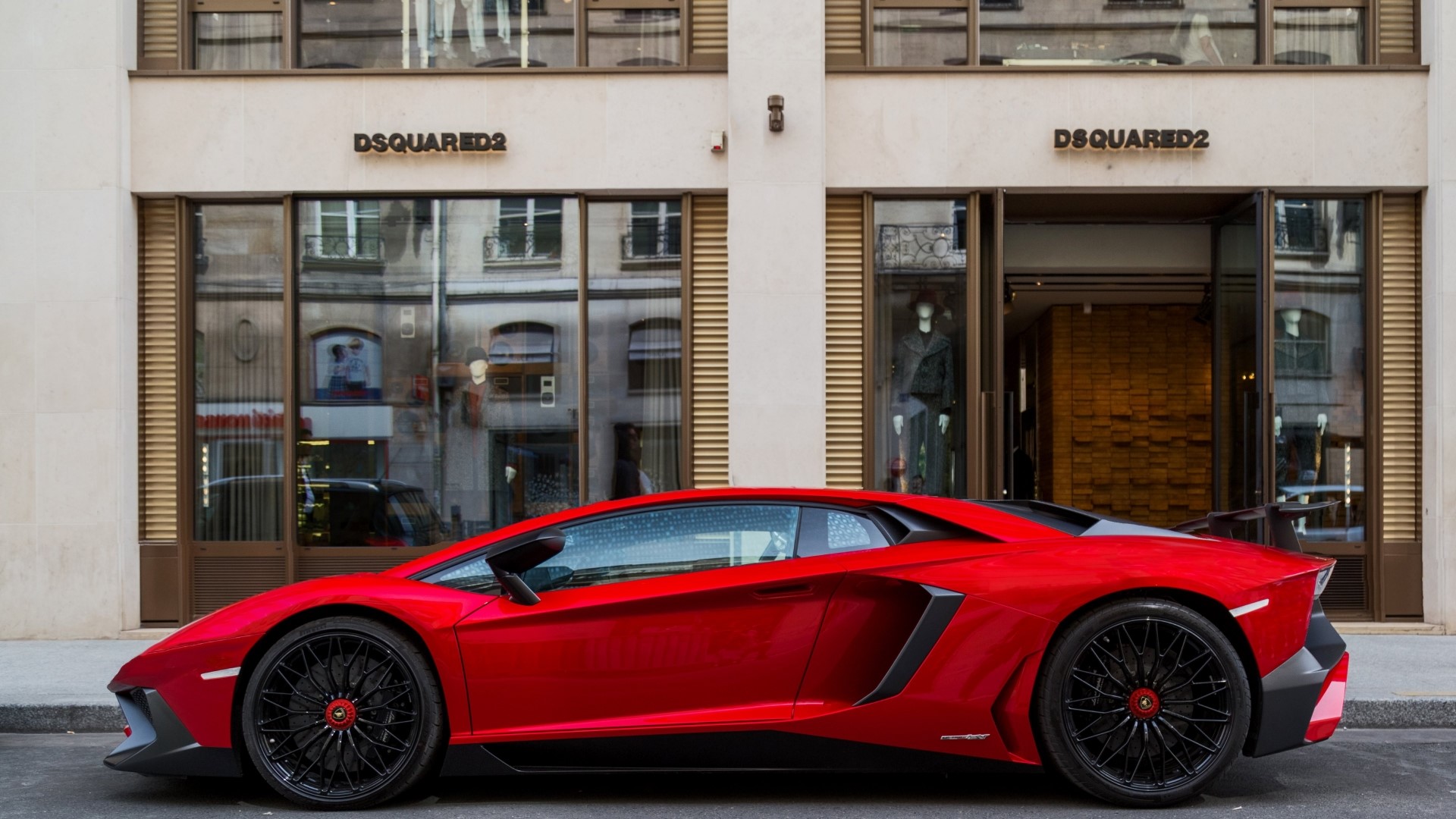 Red Lamborghini Aventador parked in front of Dsquared2 store HD Wallpaper