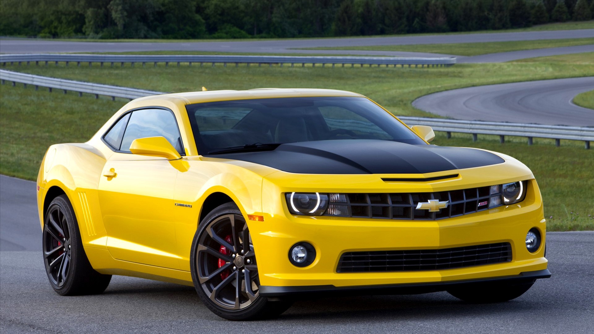 Yellow Chevrolet Camaro Bumblebee on a Racetrack HD Wallpaper