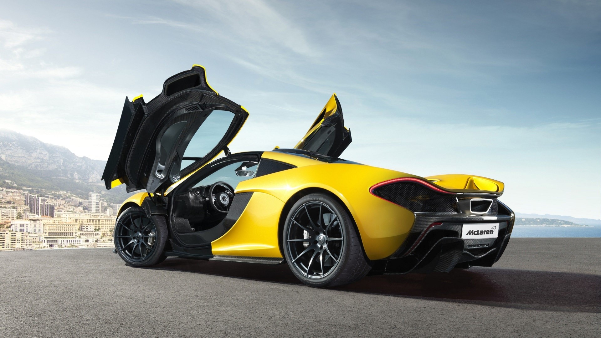 Yellow McLaren P1 with doors open HD Wallpaper