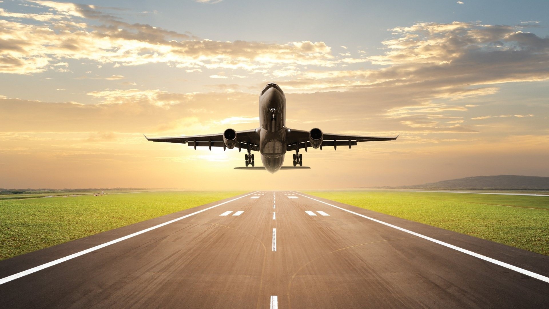 Airplane taking off from runway at sunset HD Wallpaper