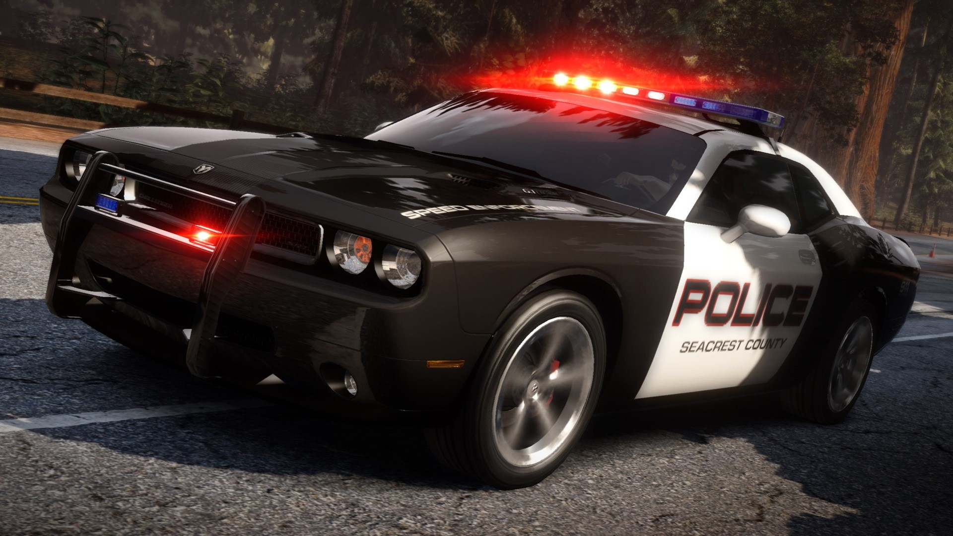 Police car with flashing lights on a road HD Wallpaper