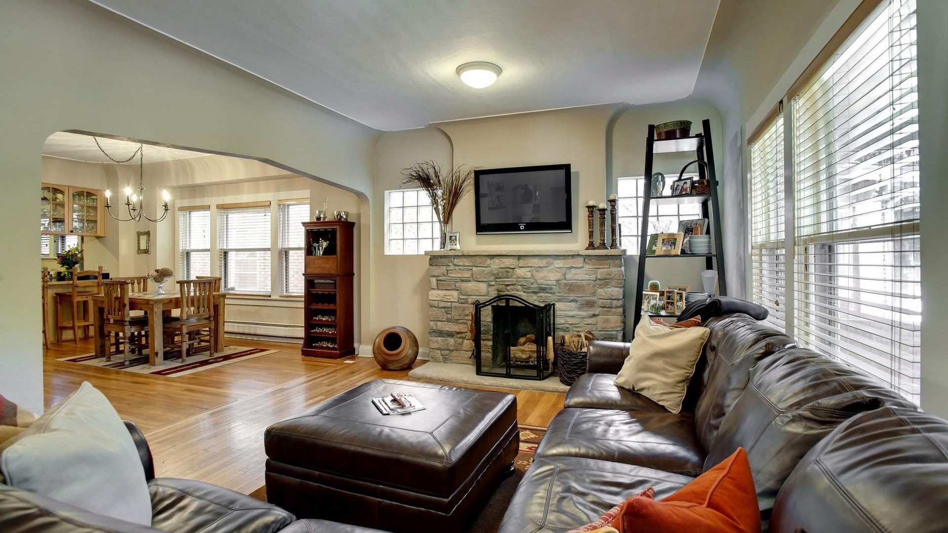 Living room with fireplace and dining area HD Wallpaper