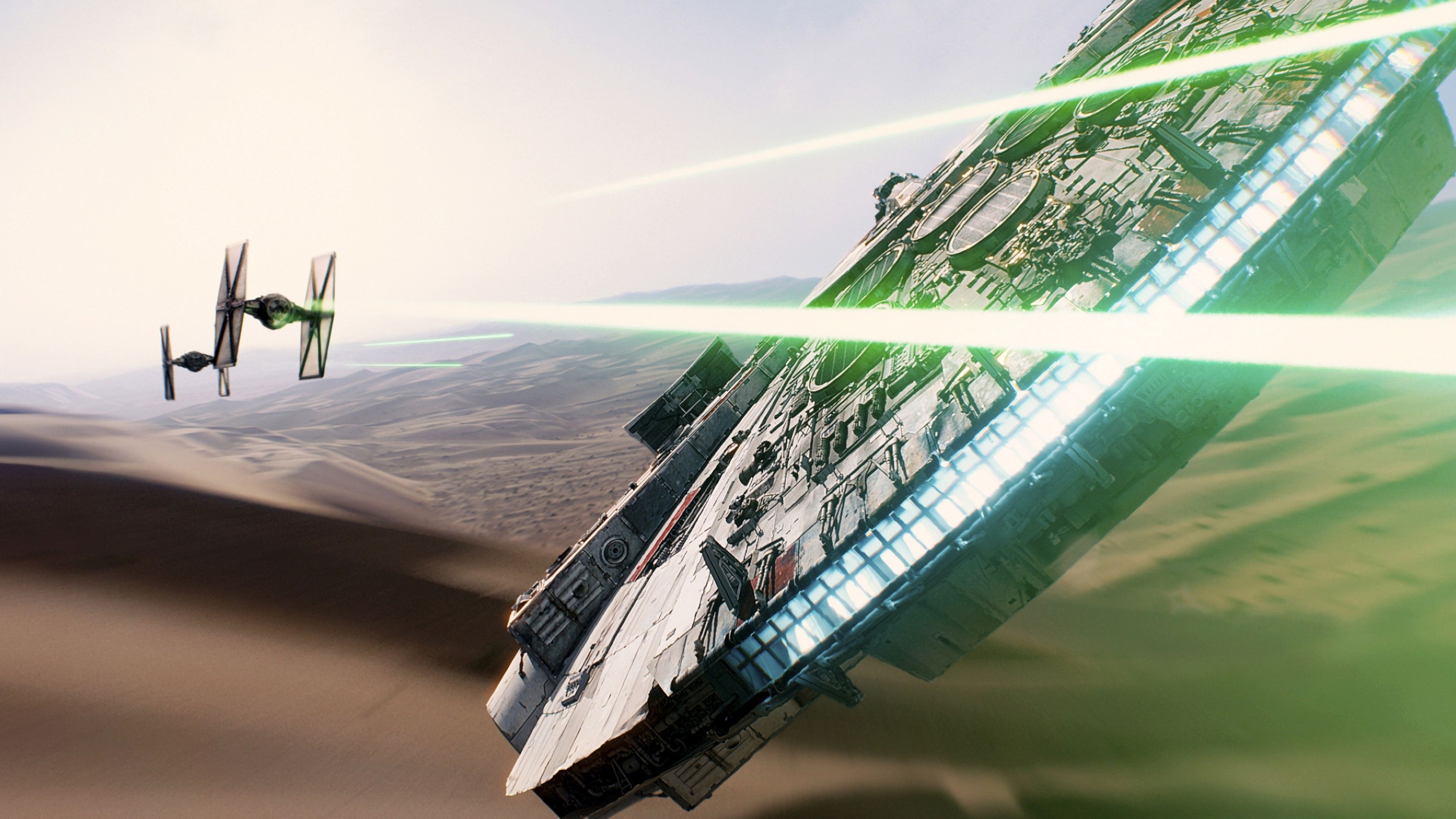 4K The Millennium Falcon in desert battle HD Wallpaper
