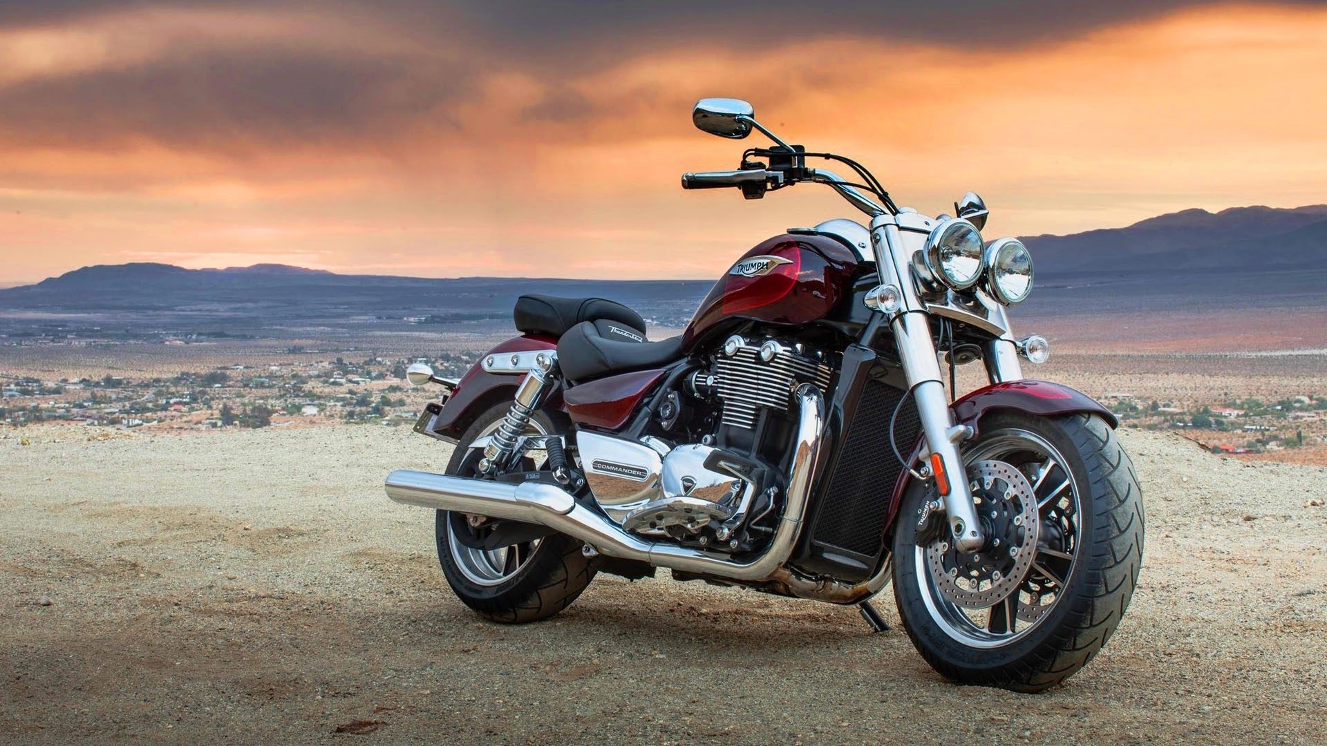 Triumph Thunderbird motorcycle in a desert landscape HD Wallpaper