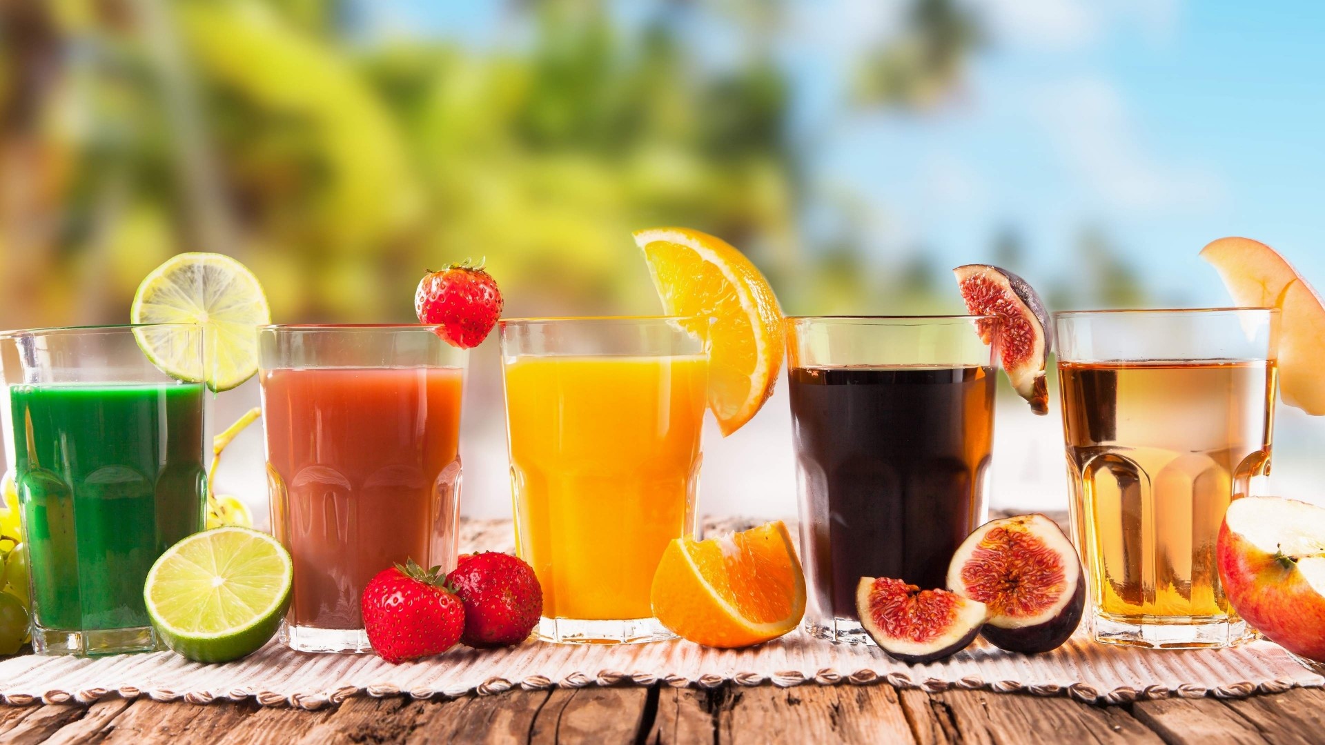 Assortment of Refreshing Fruit Juices and Drinks HD Wallpaper