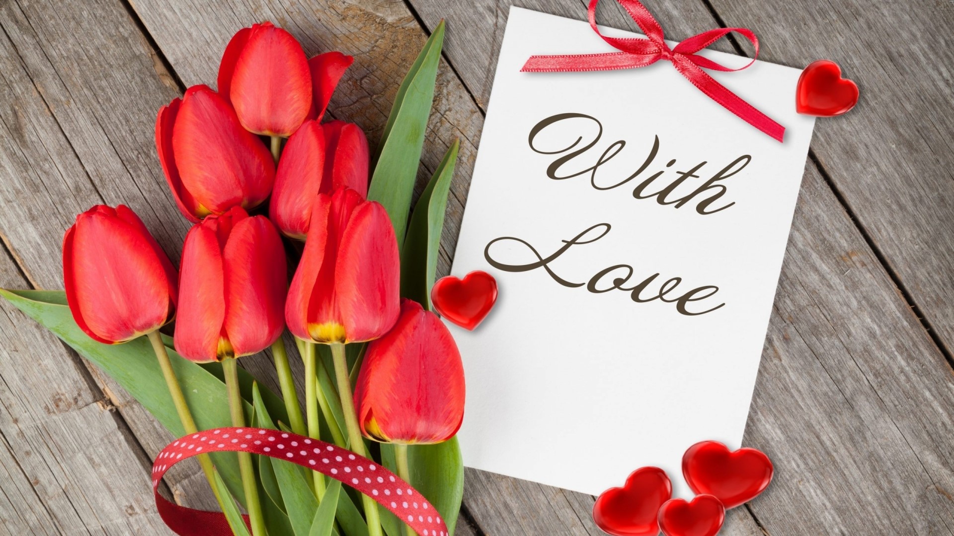 Red tulips with a "With Love" card and hearts HD Wallpaper