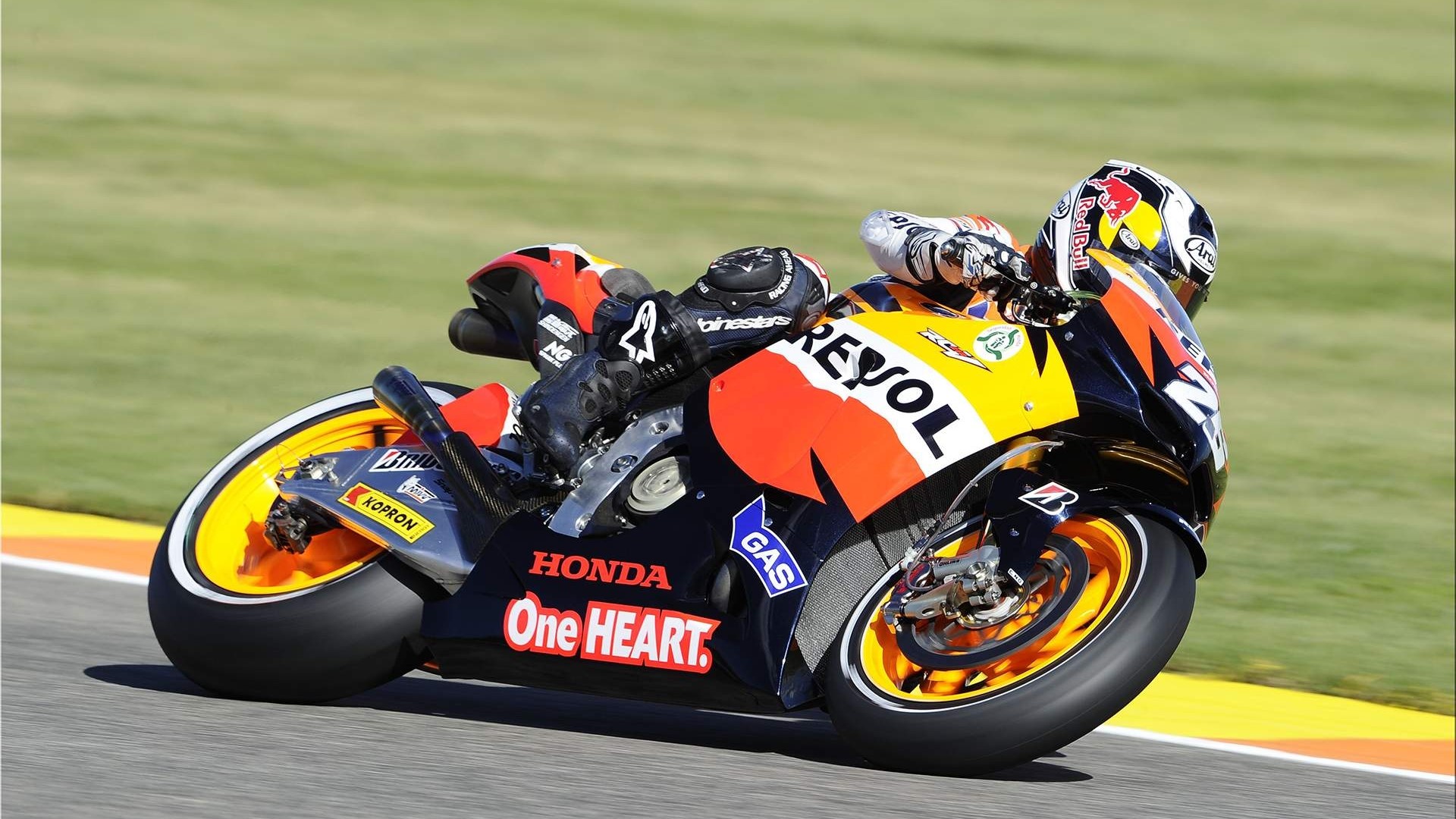 Repsol Honda Motorcycle Racer on Track HD Wallpaper