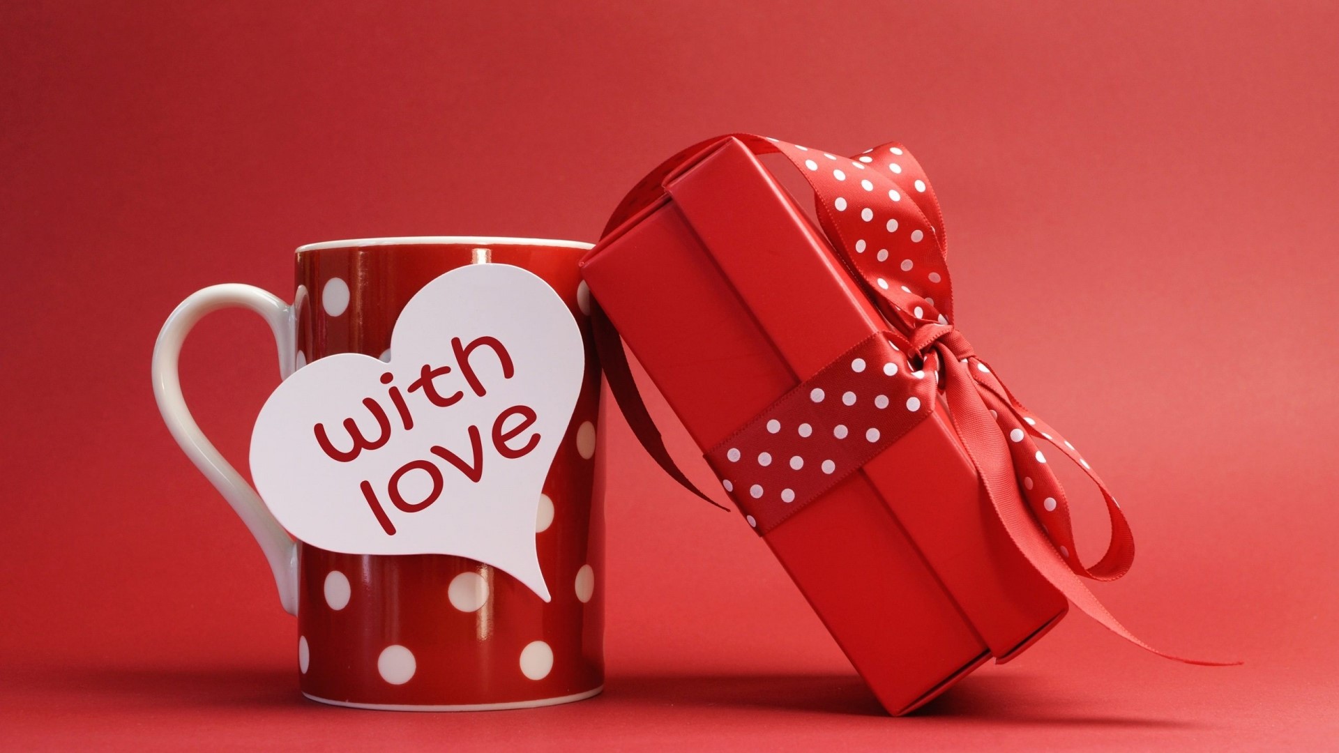 Red mug with white polka dots and a red gift box HD Wallpaper