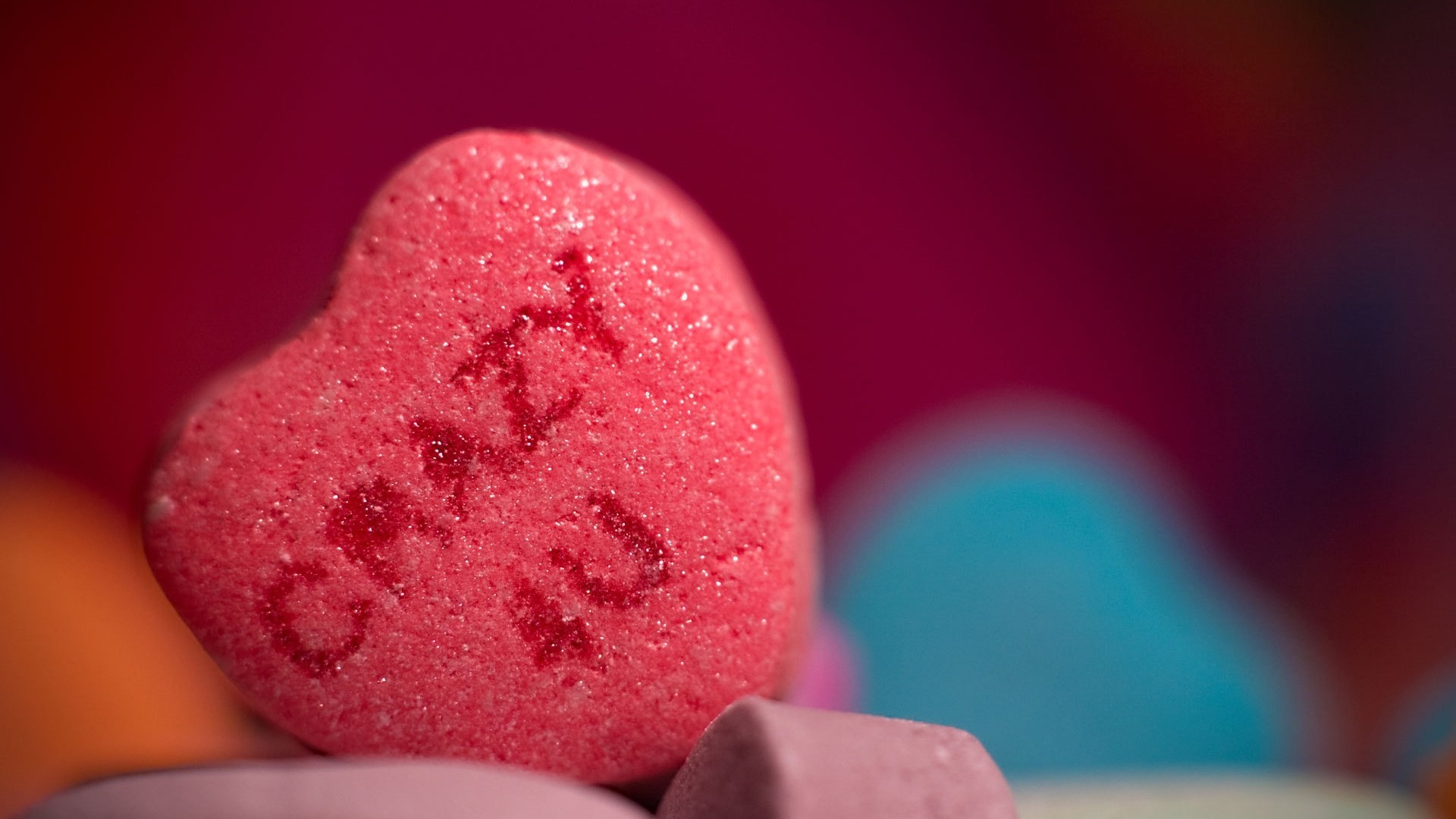 Heart-shaped candy with "I Love You" inscription HD Wallpaper