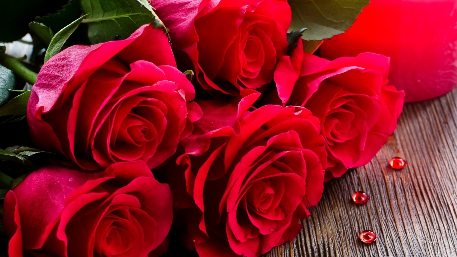 Red Roses on Wooden Surface HD Wallpaper