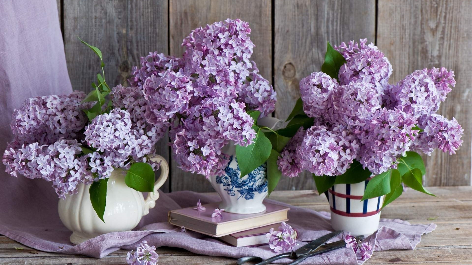 Lilac Bouquets in Vases on Wooden Table HD Wallpaper