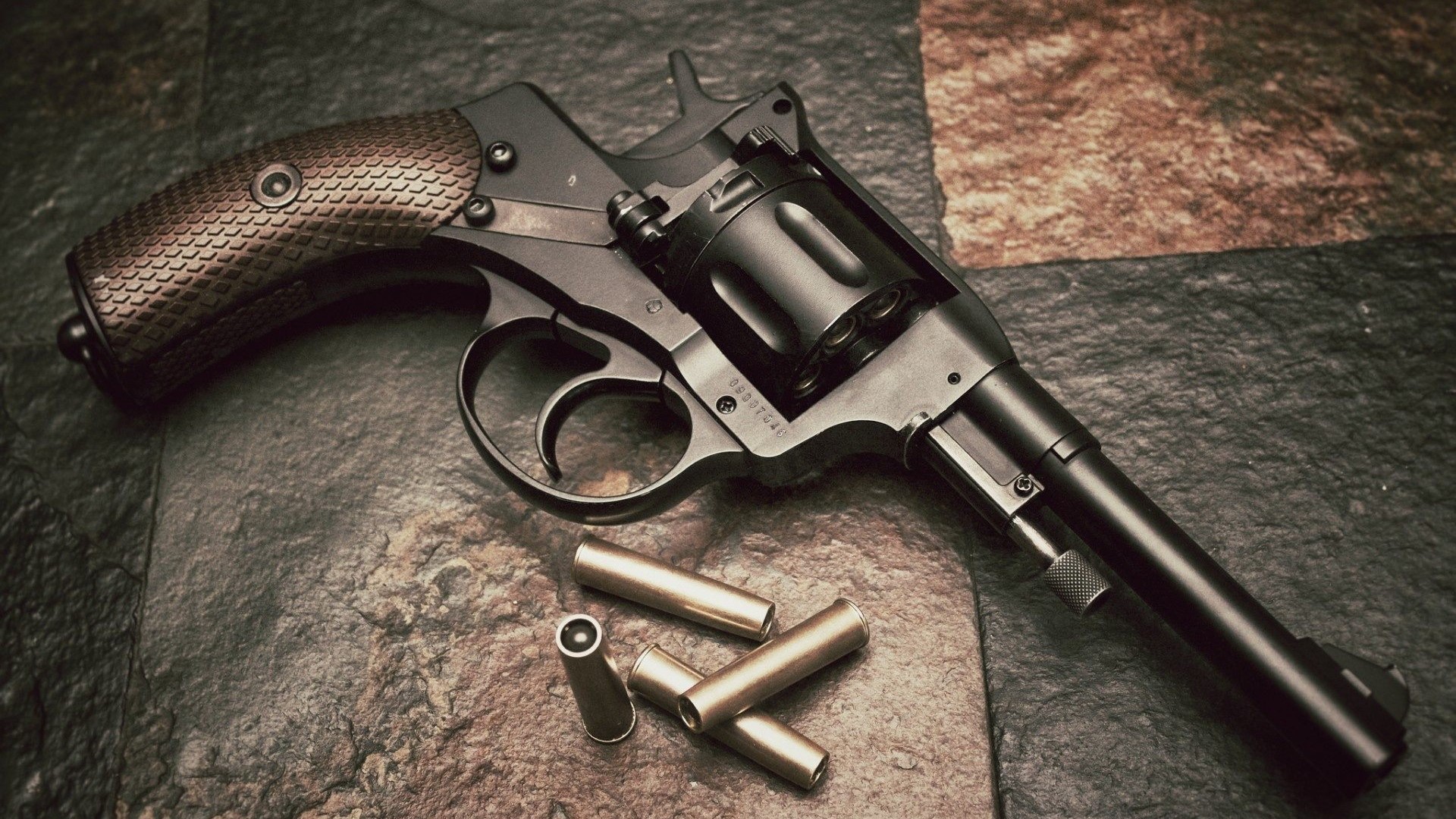Nagant M1895 Revolver with Cartridges HD Wallpaper