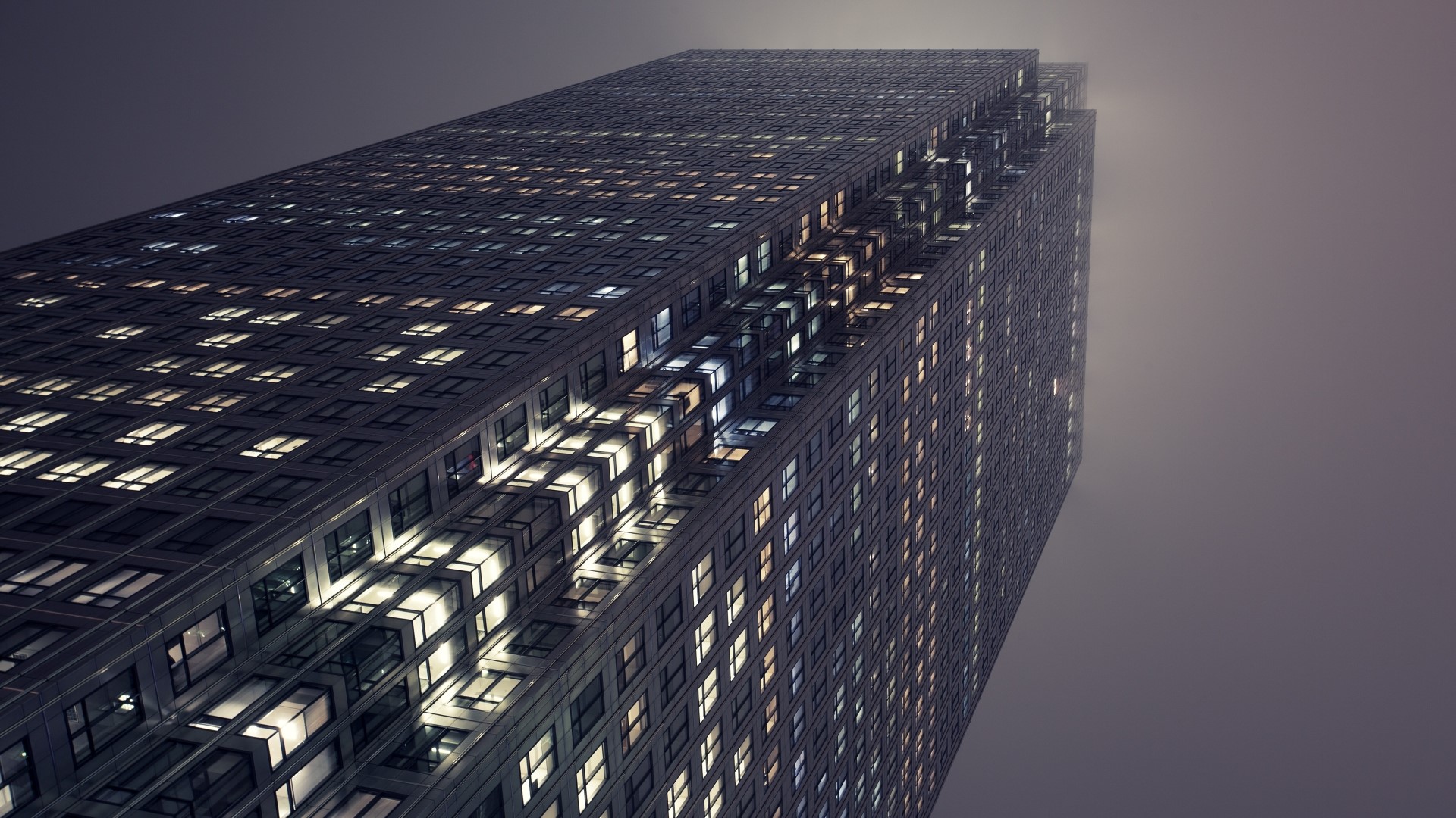 Skyscraper in night fog HD Wallpaper
