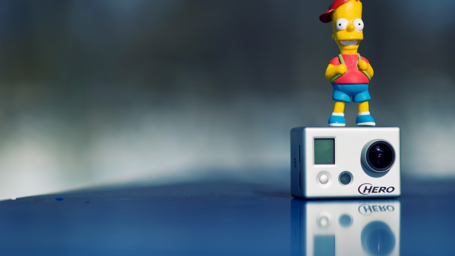 Bart Simpson toy on a GoPro Hero camera HD Wallpaper