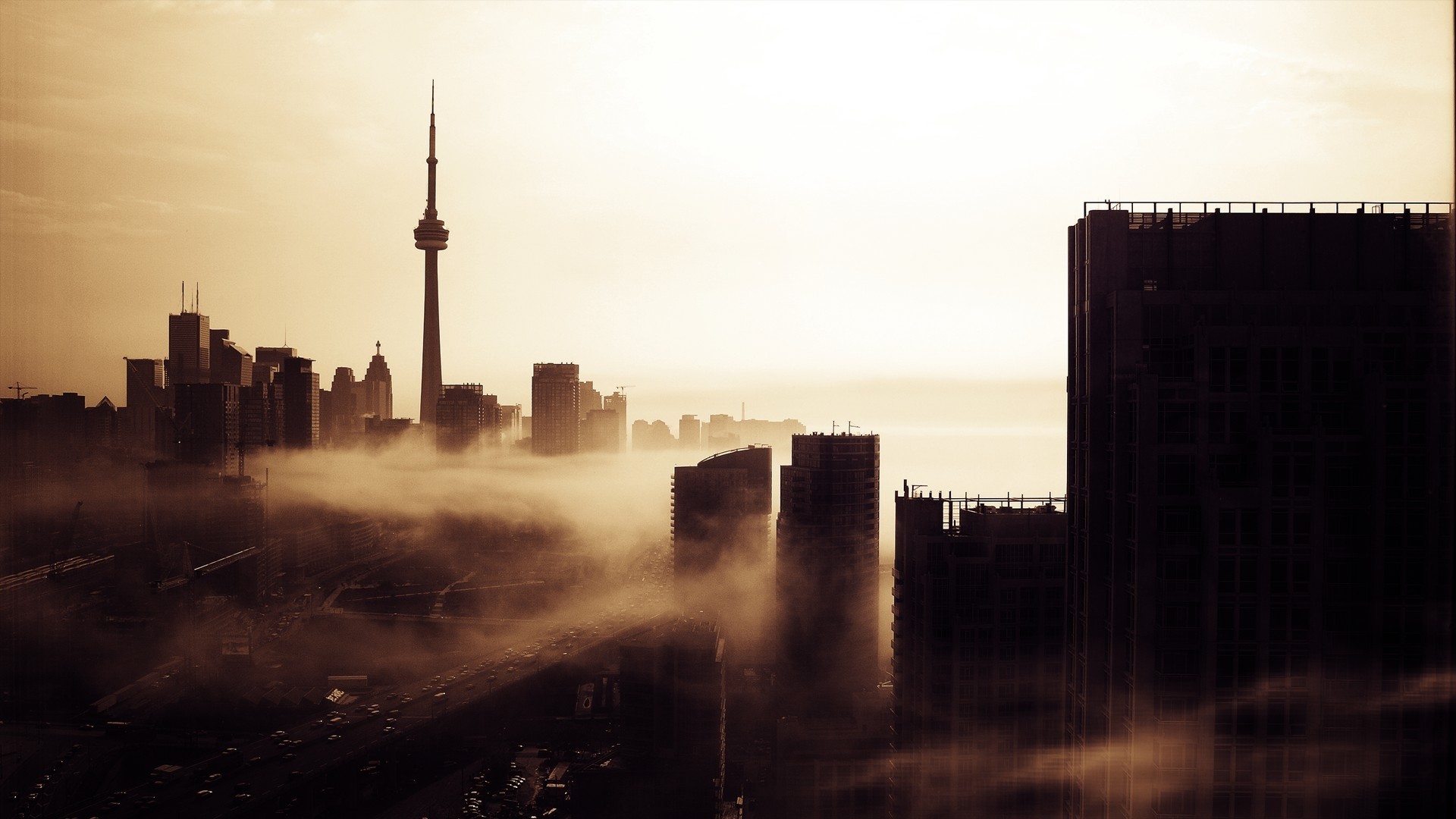 Toronto CN Tower shrouded in mist at sunrise HD Wallpaper