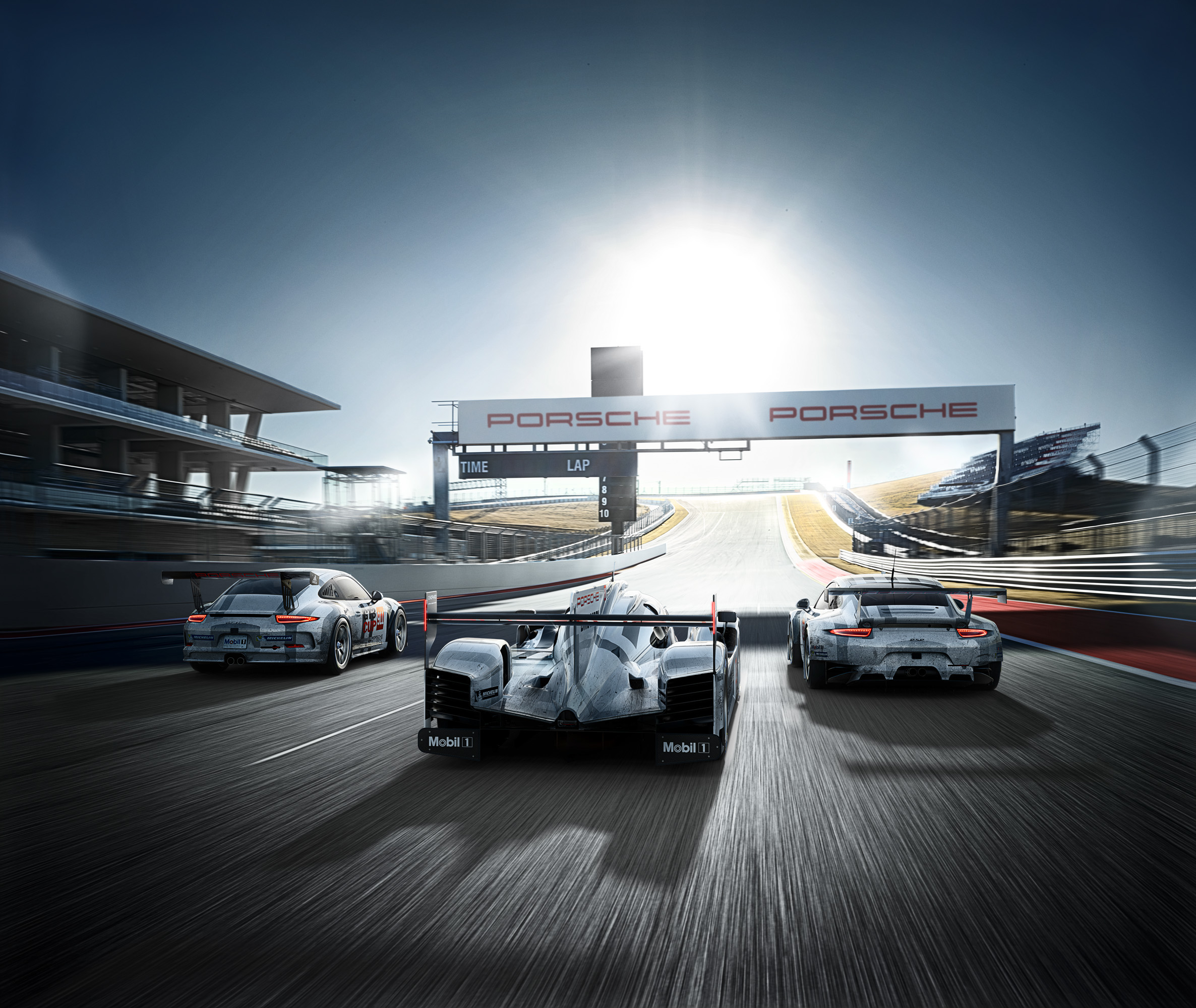 Porsche 919 Hybrid and 911 RSR race cars on track HD Wallpaper
