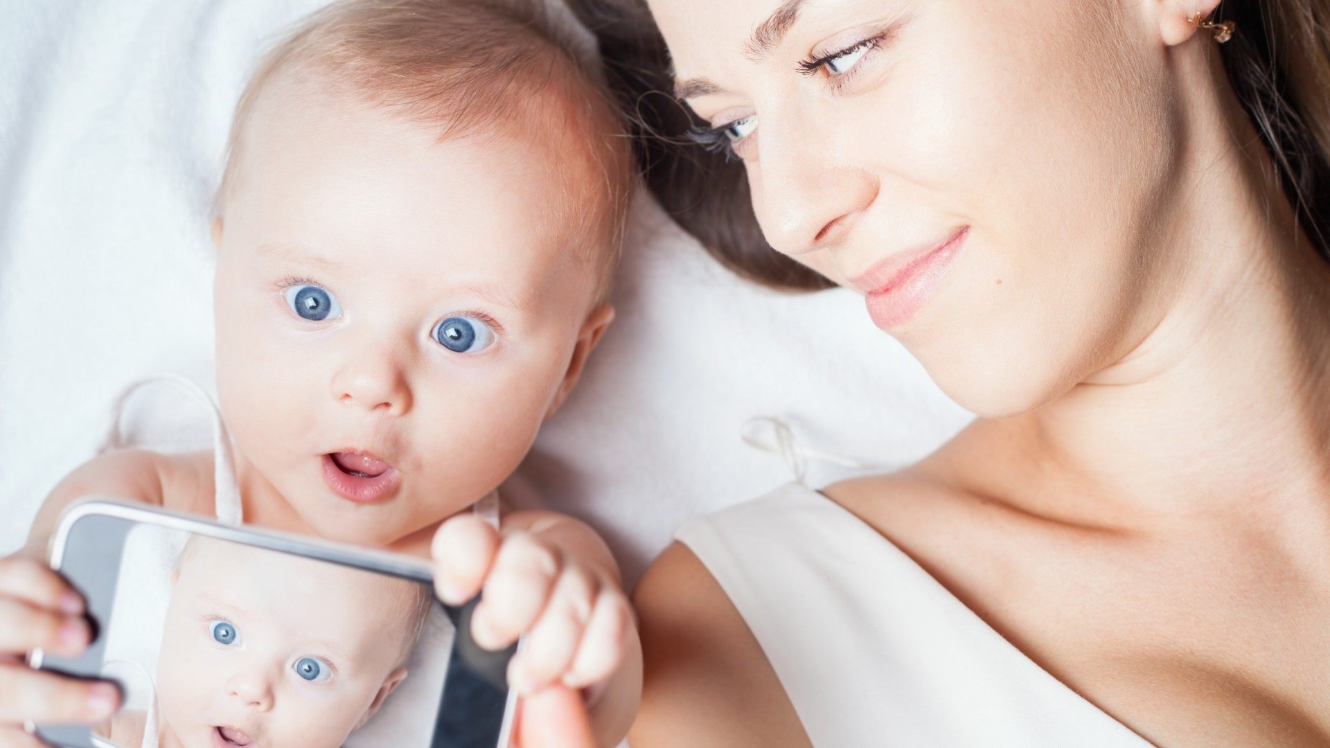 Mother and Baby Taking a Selfie HD Wallpaper