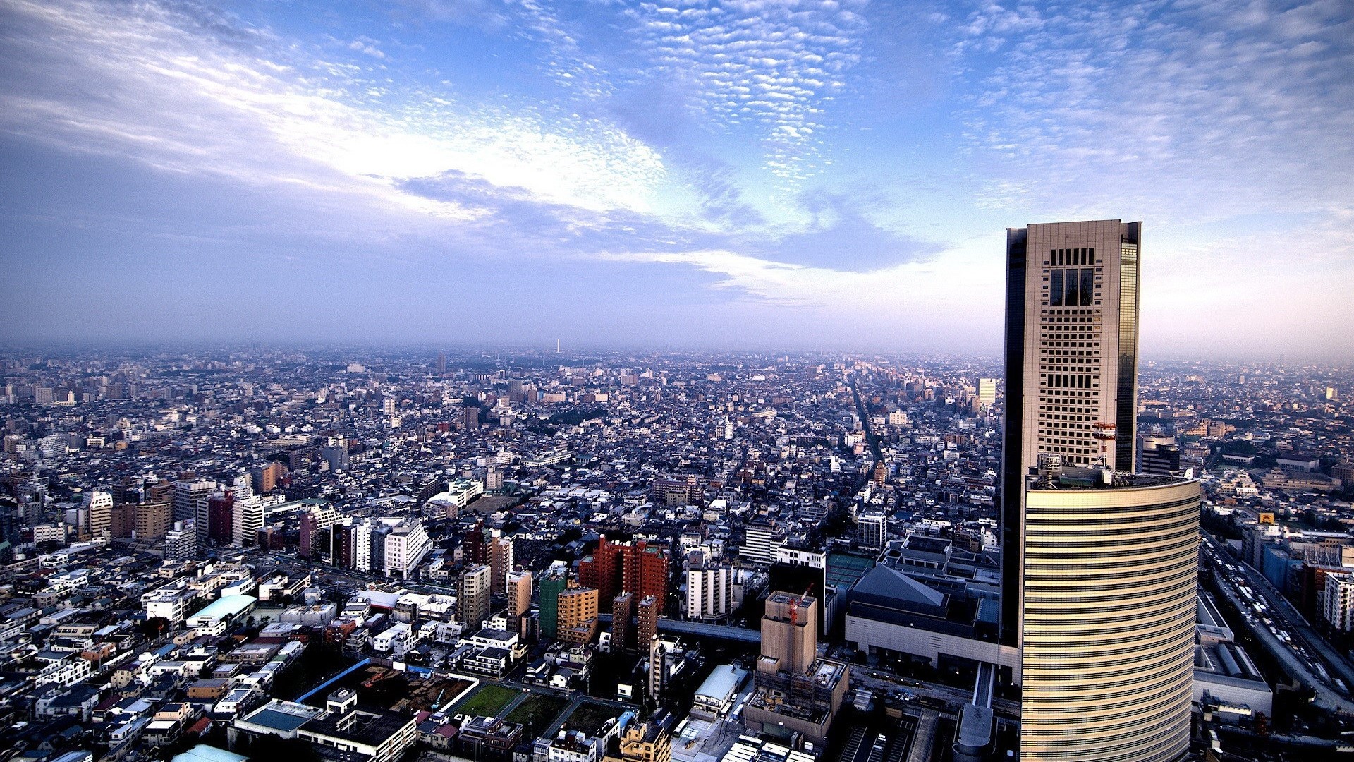 Cityscape with skyscrapers and clouds HD Wallpaper