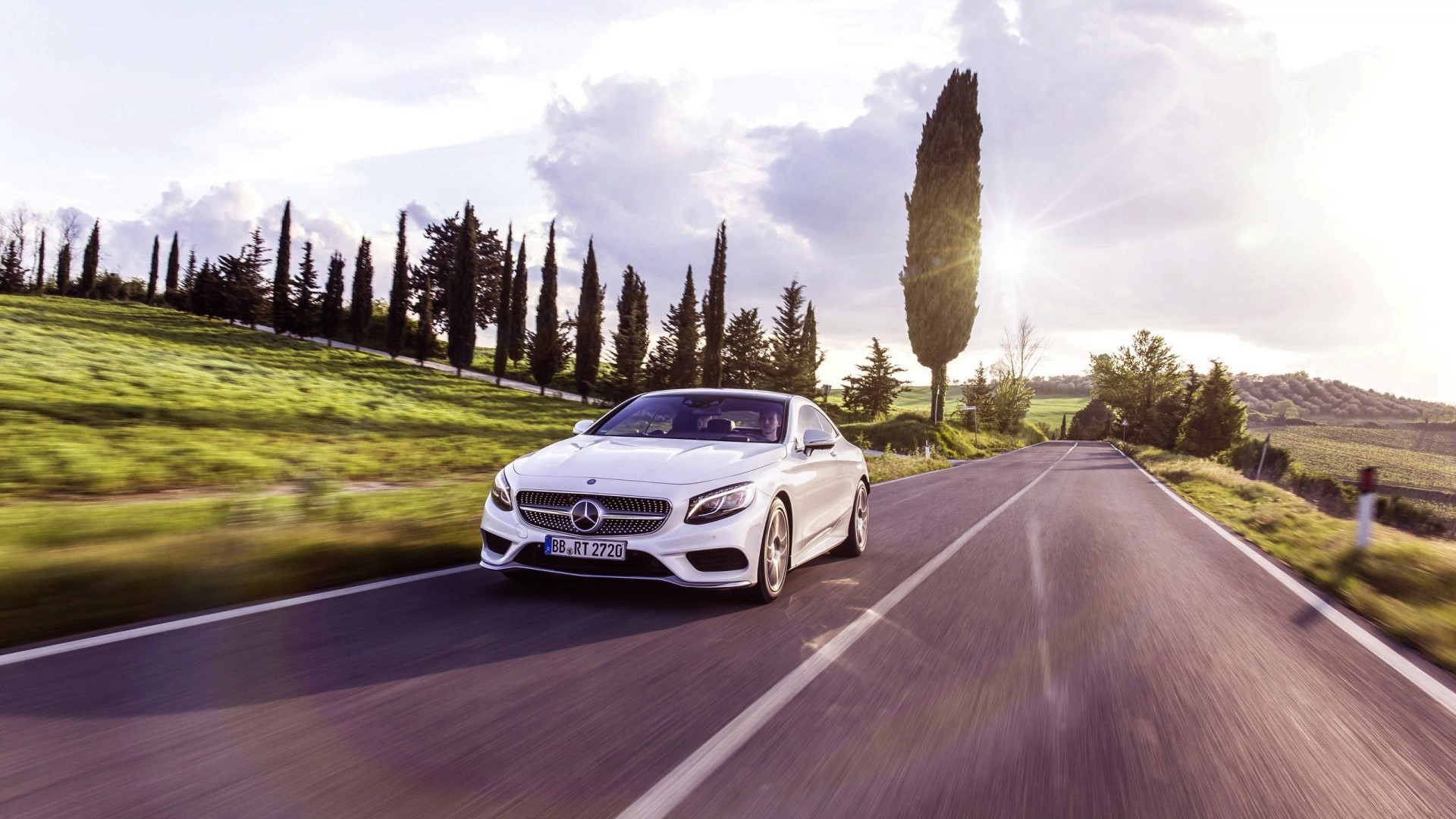 White Mercedes S Class Coupe driving on a road HD Wallpaper