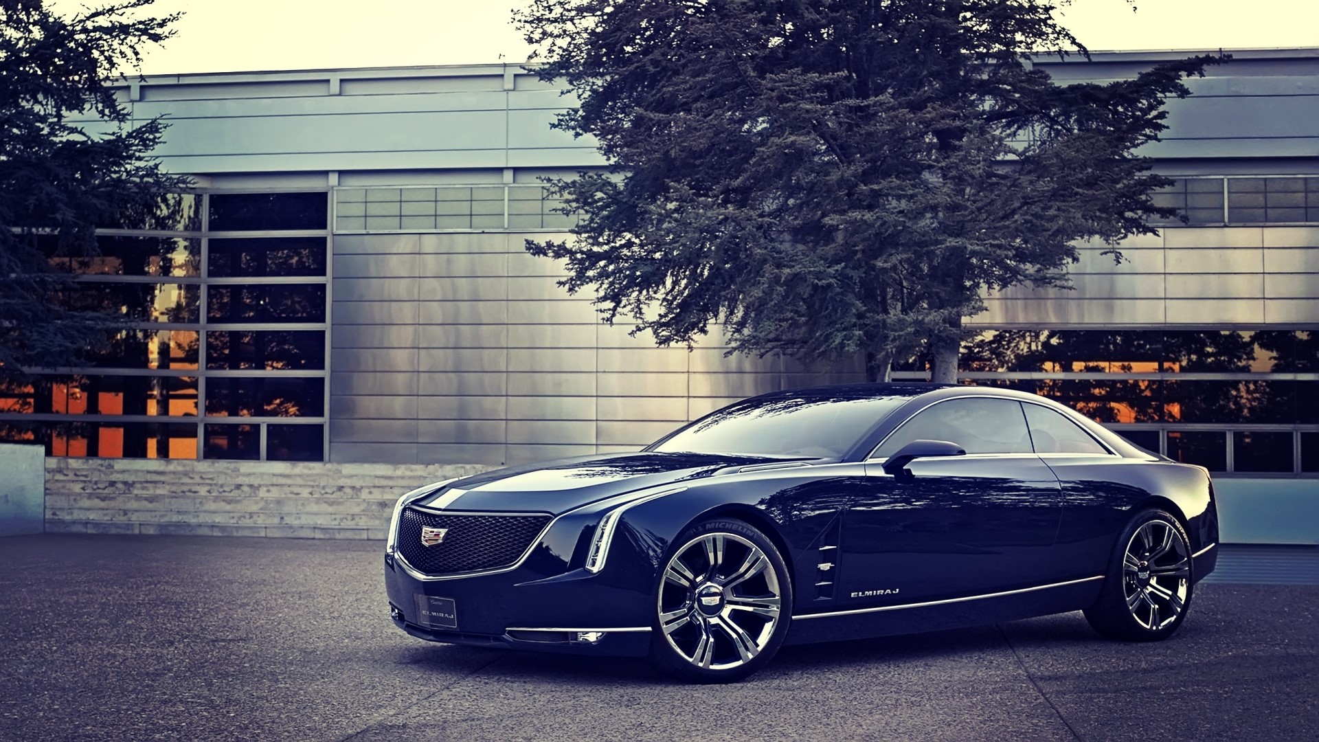 Cadillac Elmiraj Concept car parked outside a modern building HD Wallpaper
