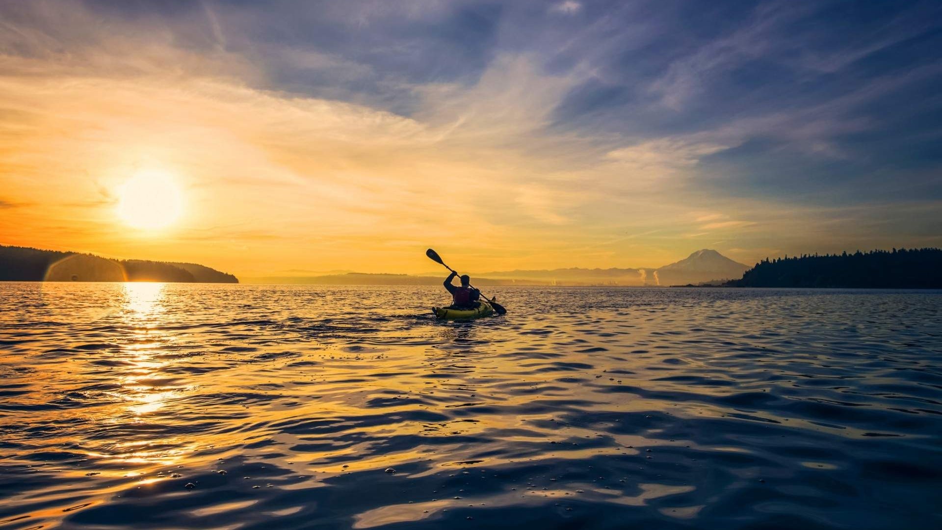 Person kayaking on the sea at sunset HD Wallpaper