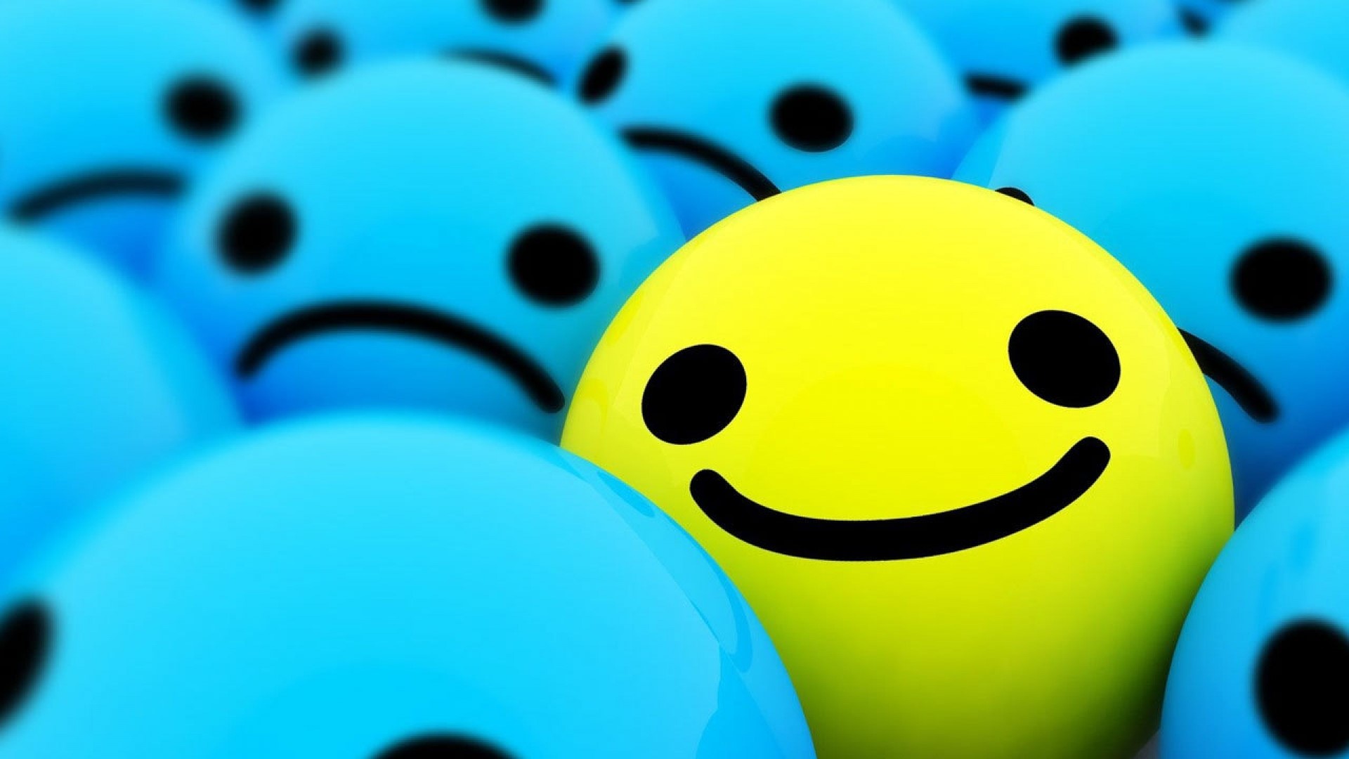 Happy smiley face among sad faces HD Wallpaper