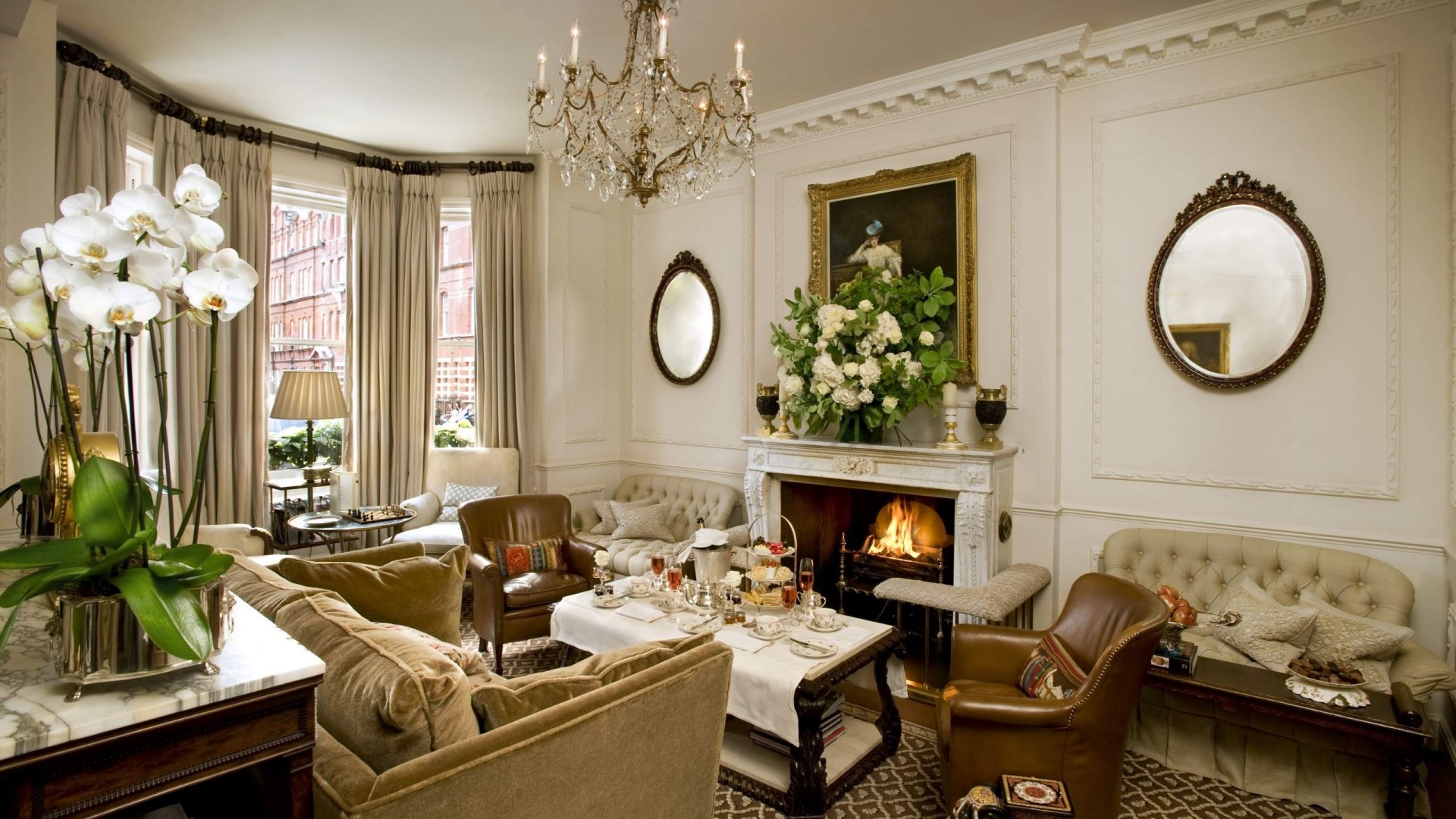 Elegant Living Room with Fireplace and Tea Service HD Wallpaper