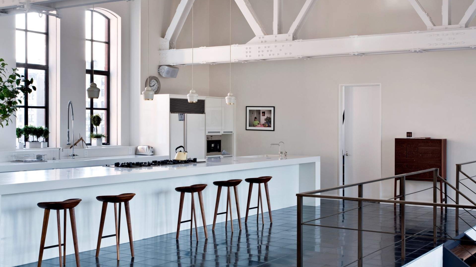 Modern loft kitchen with island and stools HD Wallpaper