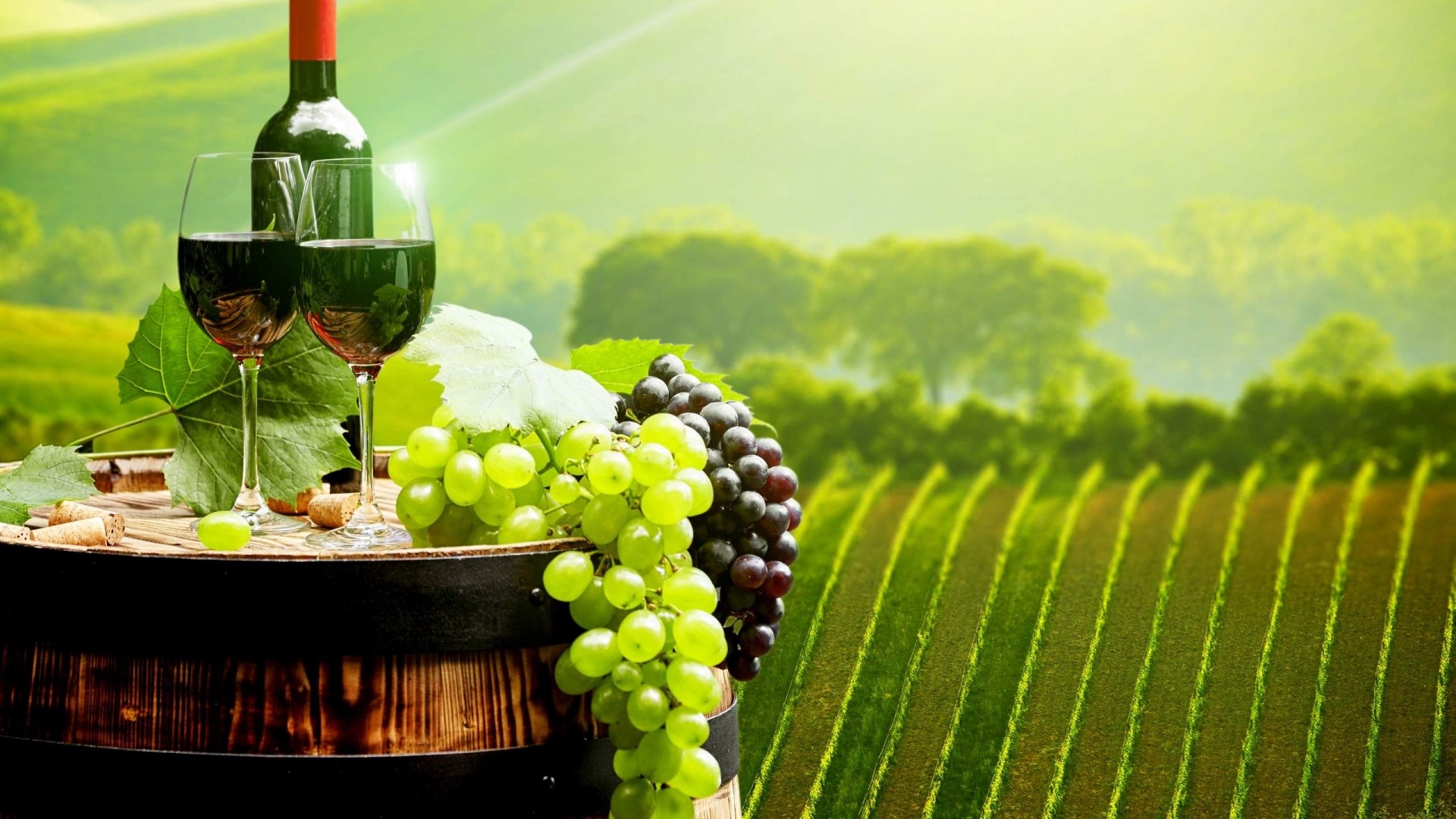 Wine bottle and glasses with grapes on a barrel HD Wallpaper