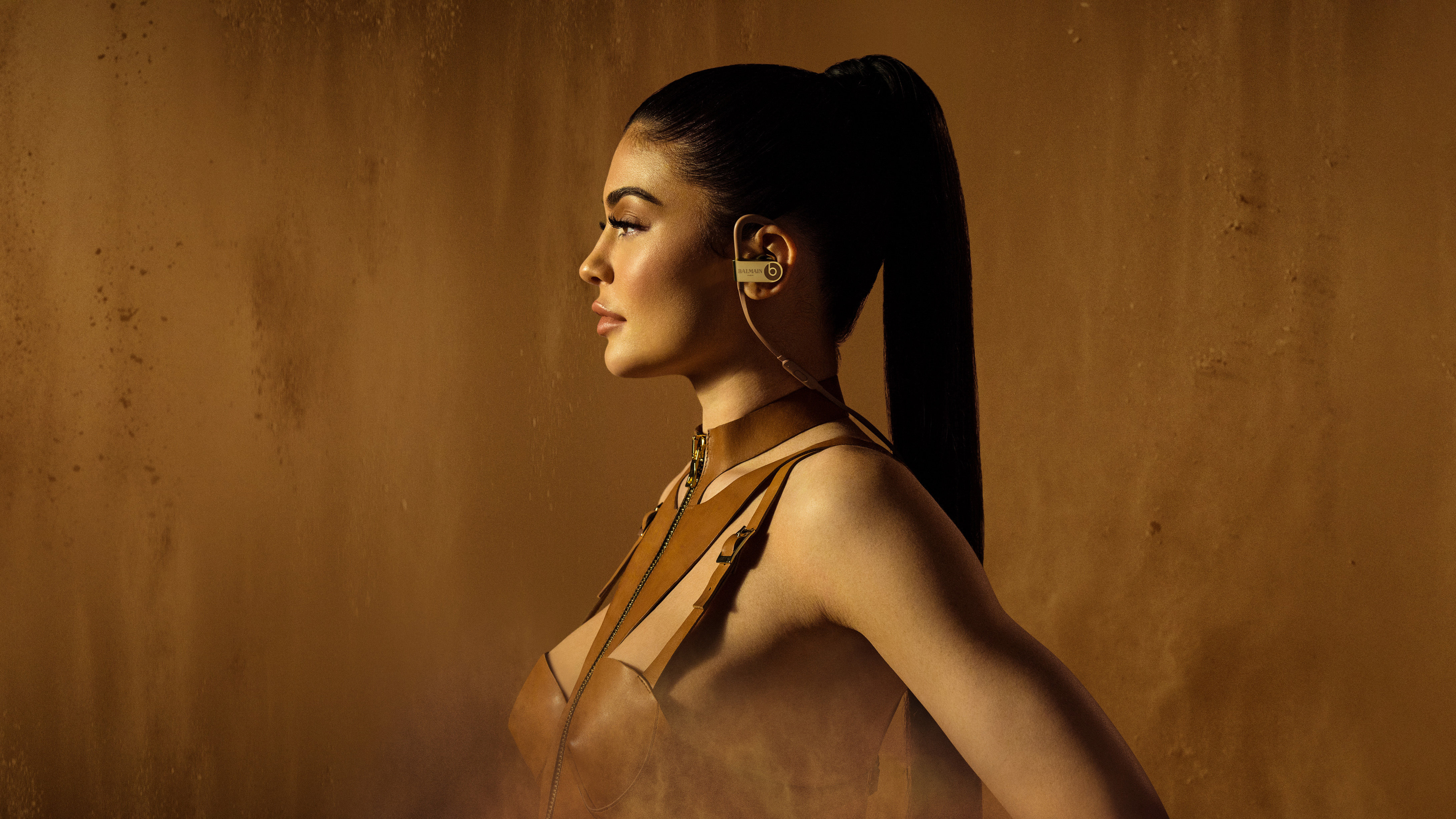 Kylie Jenner with Balmain earbuds in 4K HD Wallpaper