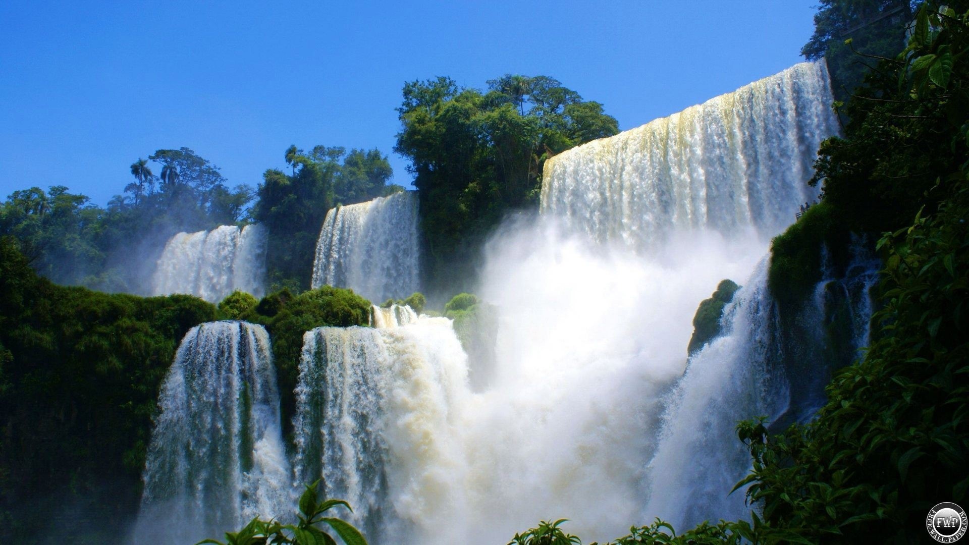 Beautiful Waterfall with Lush Greenery HD Wallpaper