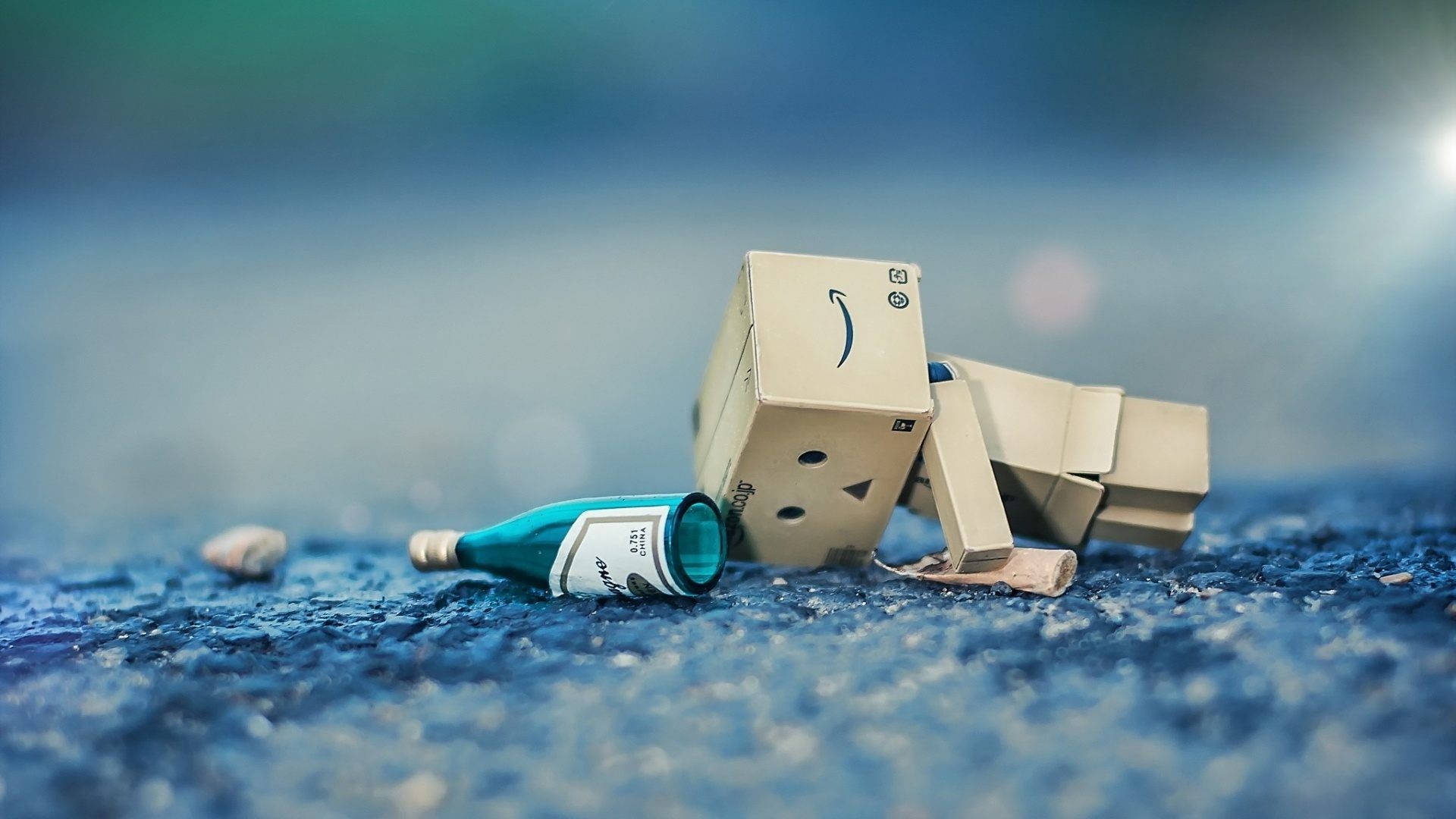 Danbo robot and bottle on ground HD Wallpaper