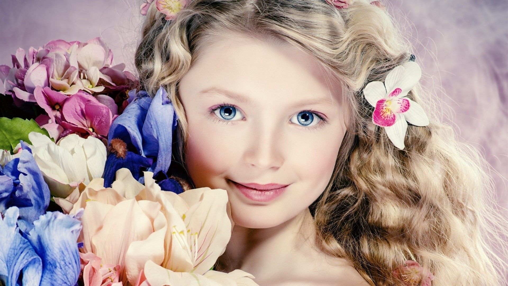 Cute girl with curly hair and flowers HD Wallpaper