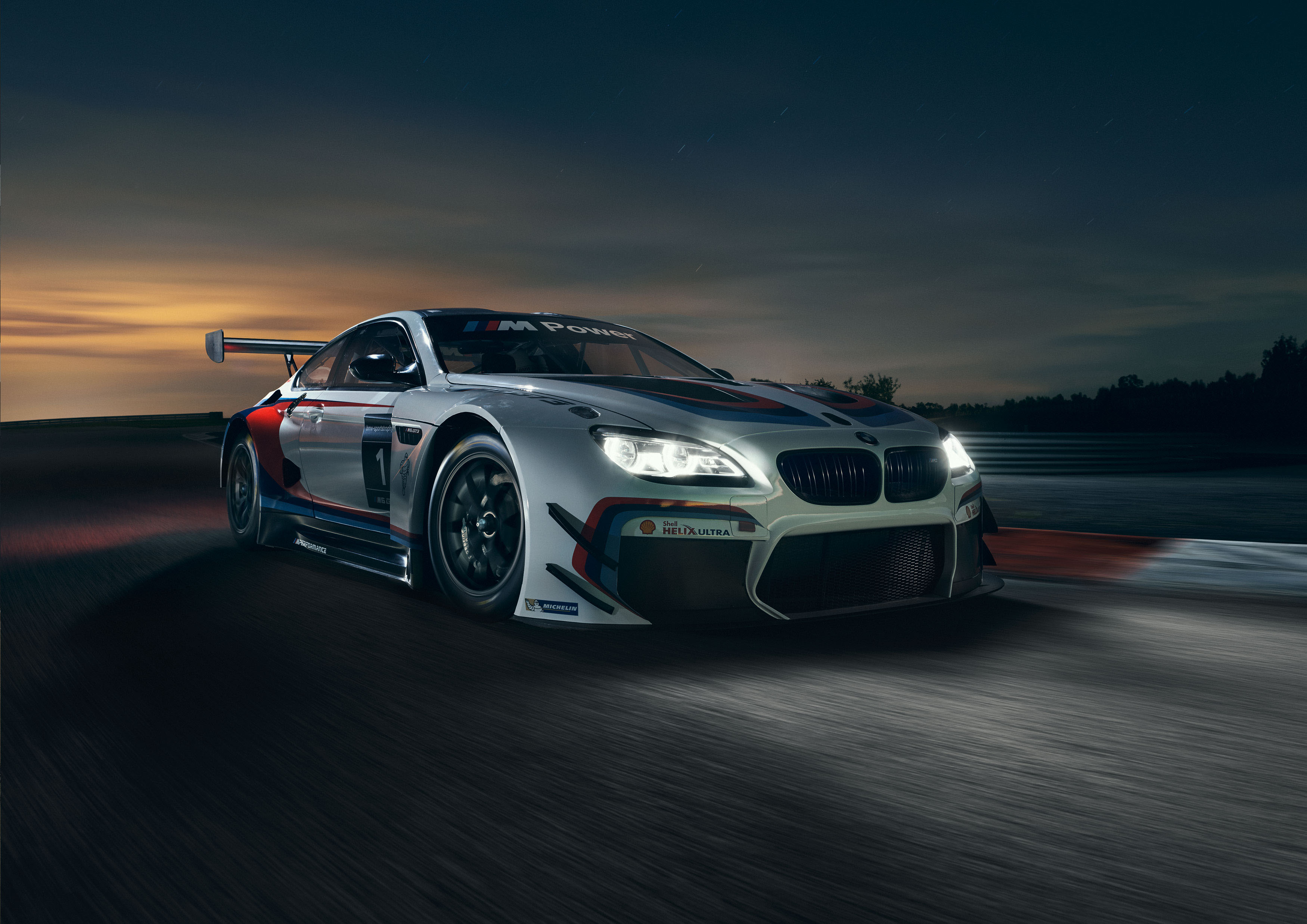 BMW M6 GT3 race car on track at dusk HD Wallpaper