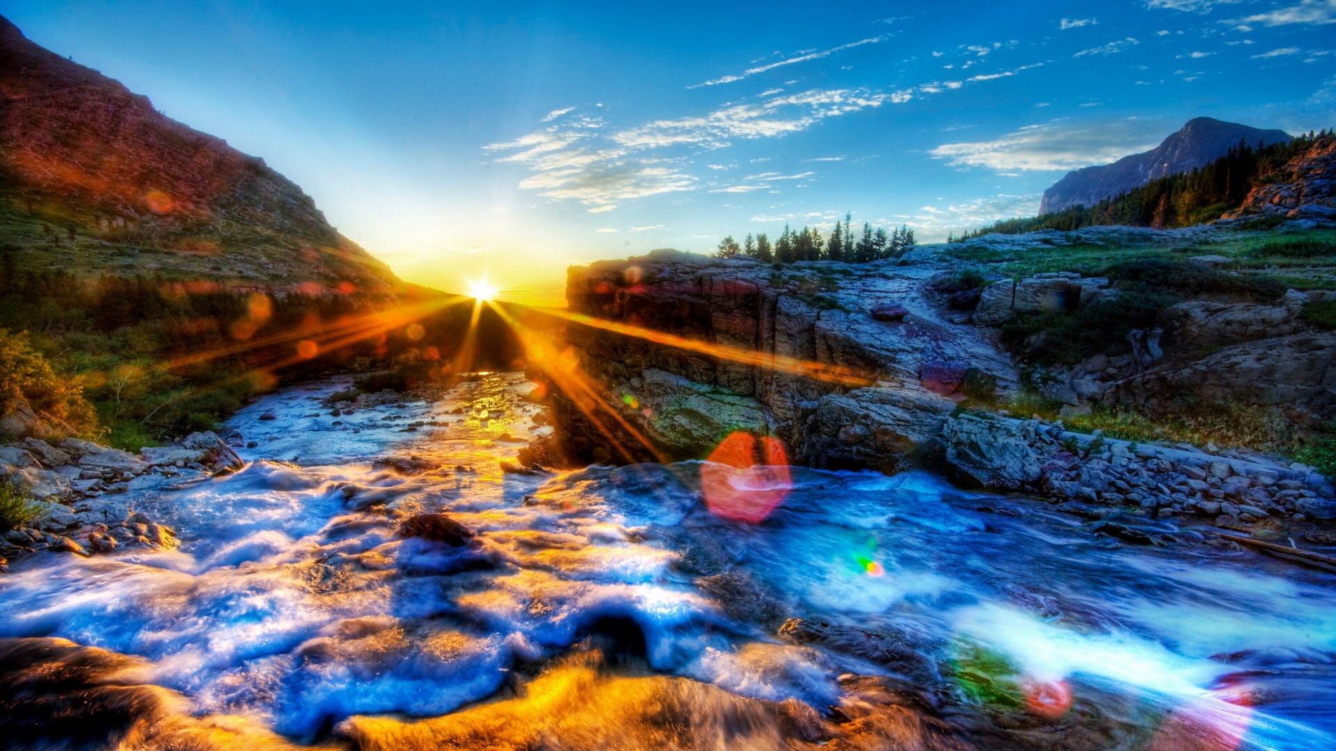 Sunrise over a mountain stream with rocky terrain HD Wallpaper