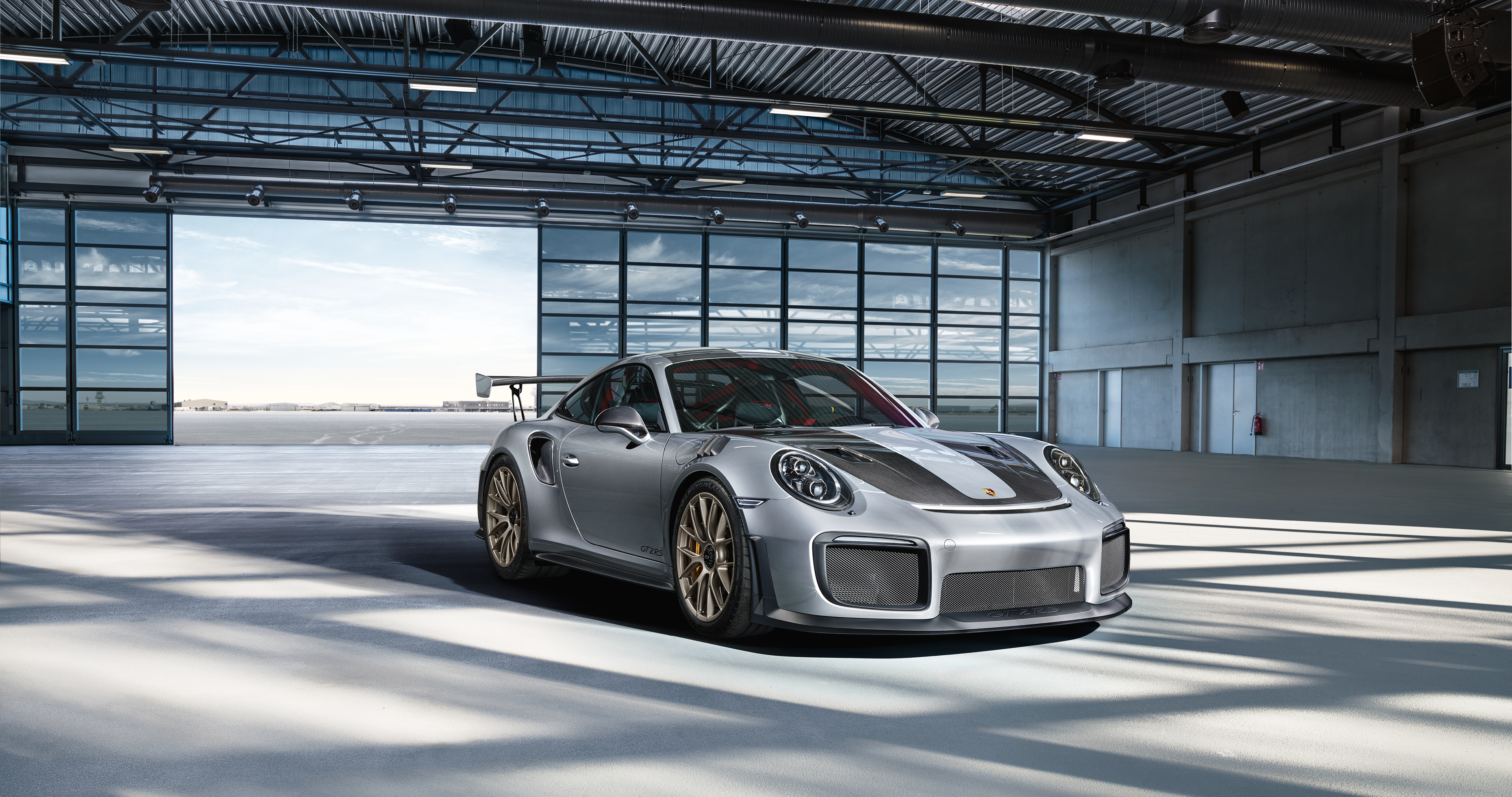 2018 Porsche 911 GT2 RS in a hangar HD Wallpaper